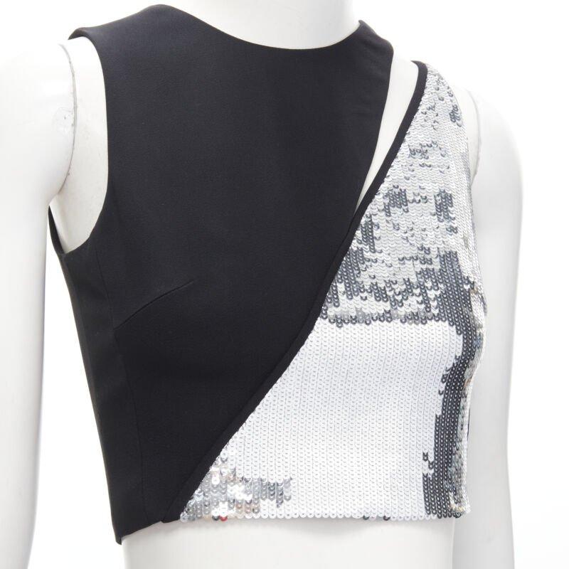 DAVID KOMA silver sequins midriff crop top asymmetric high slit skirt set UK6 XS
Reference: AAWC/A00345
Brand: David Koma
Collection: Runway
Material: Acrylic, Blend
Color: Silver, Black
Pattern: Solid
Closure: Zip
Lining:  Fabric
Made in: United