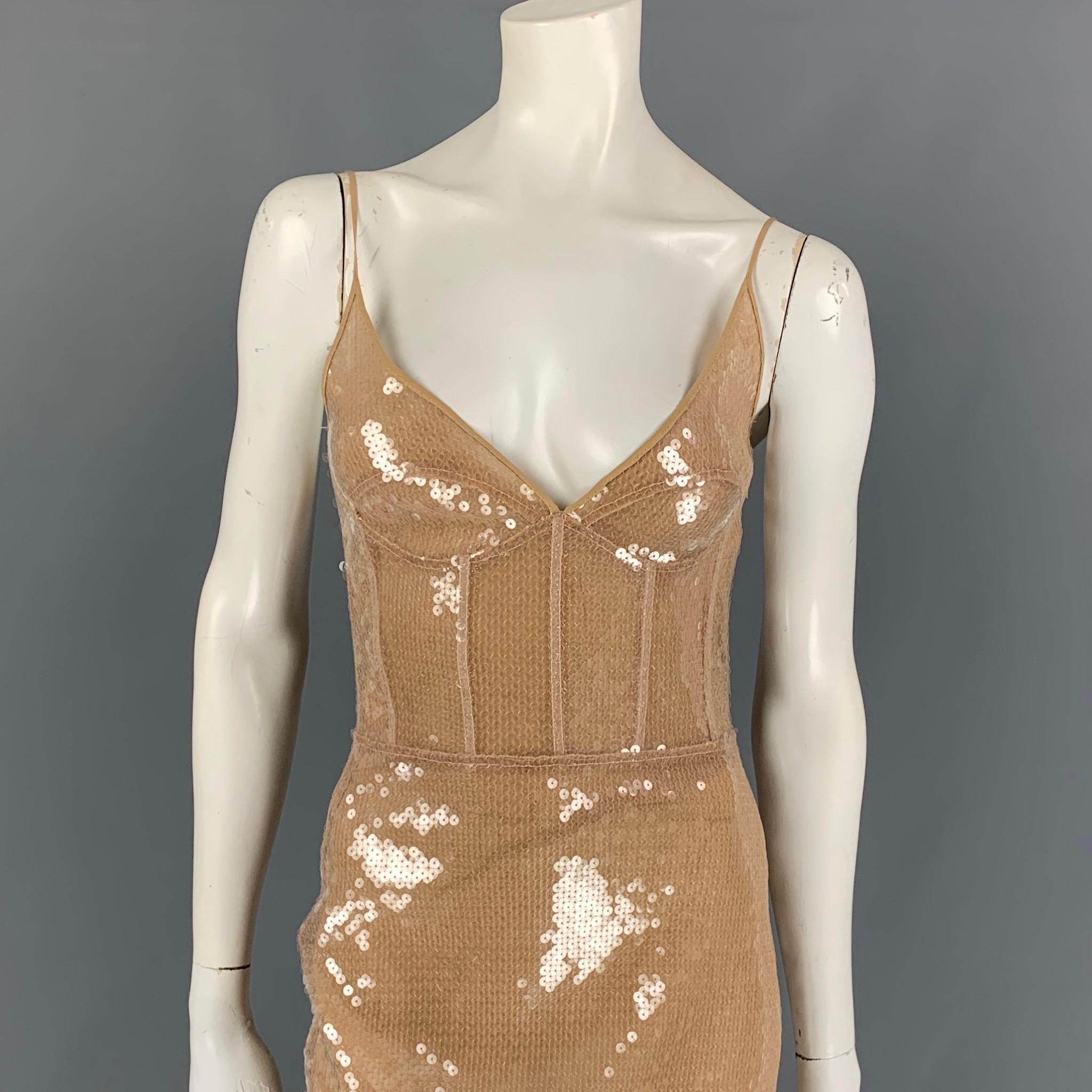 DAVID KOMA cocktail dress comes in a beige sequined silk with a slip liner featuring a bustier top, midi skirt, back slit, spaghetti straps, and a back zip up closure. 

Very Good Pre-Owned Condition.
Marked: 8
Original Retail Price:
