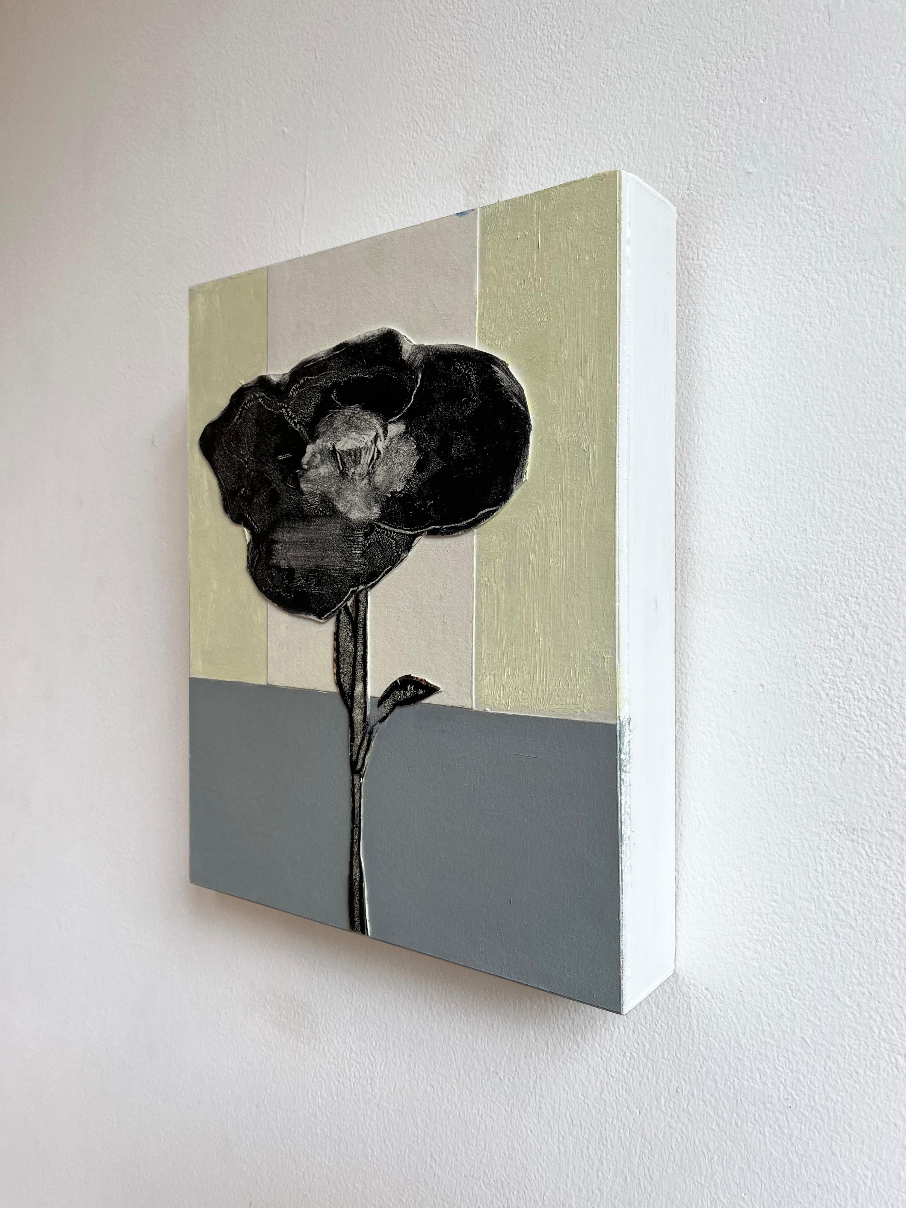 Small still-life painting on panel of a black poppy flower on a pastel yellow and slate grey background
Black Poppy, made by David Konigsberg, in 2023
monotype, oil, and collage on panel
11.5 x 9 x 2 inches 
Signed, verso
Excellent condition and