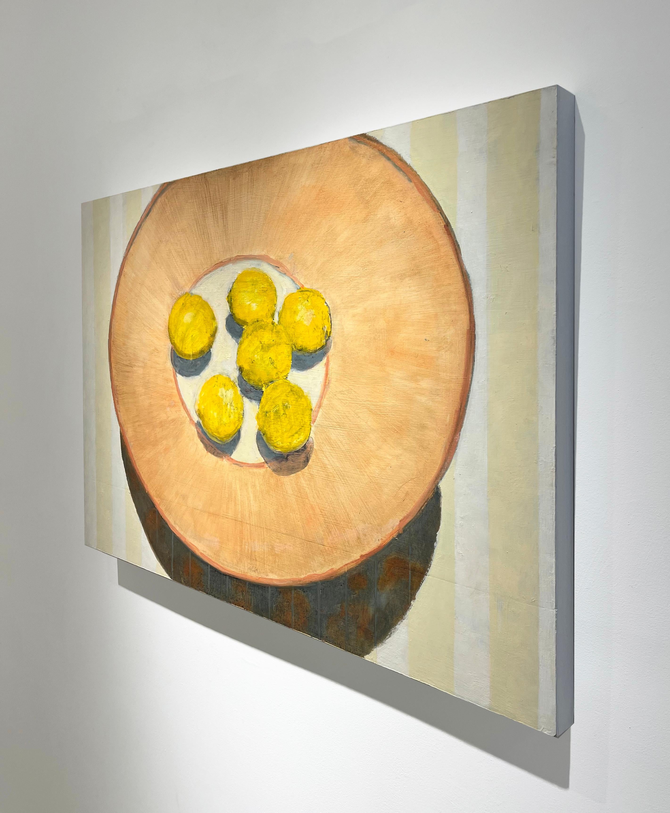 Modern still-life painting on panel of lemons in a peach colored bowl against a pastel pin striped background 
