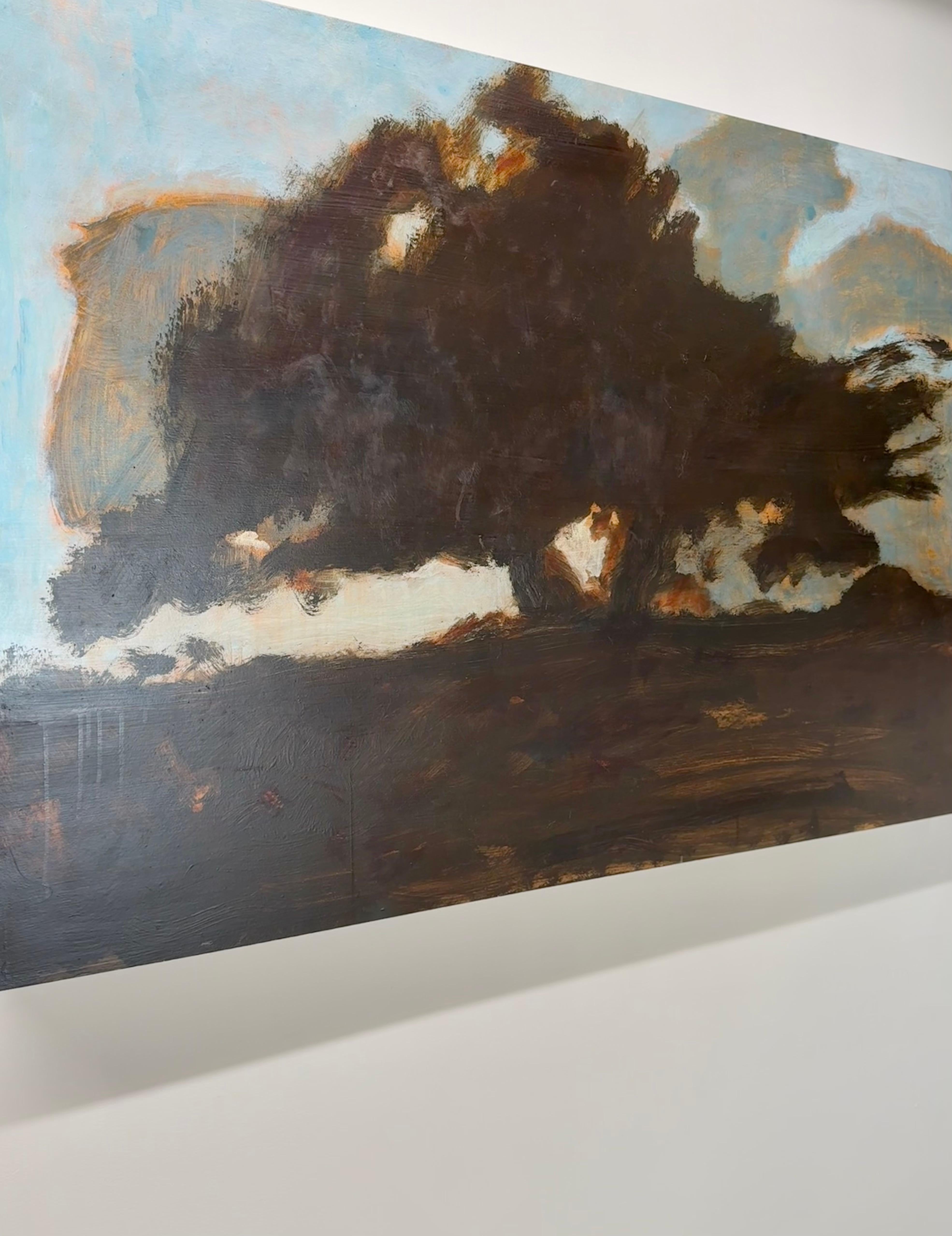 In this contemporary landscape painting in oil on panel, gray cumulus clouds float in an idyllic blue sky behind a dark beige brown oak tree in the center. Signed, dated and titled on verso.

David Konigsberg applies many layers of thinned oil paint