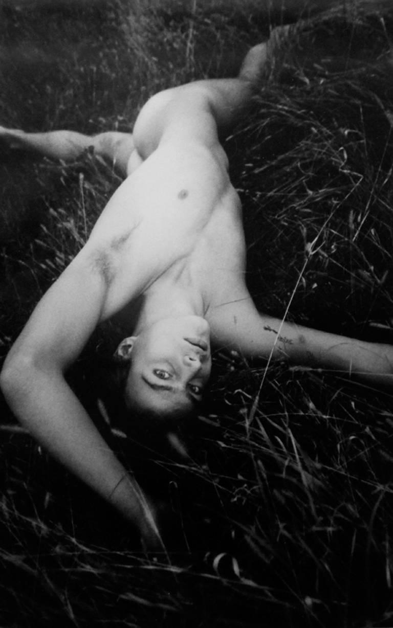 David LaChapelle Figurative Photograph - Nude Male in the Grass (White Rabbits)