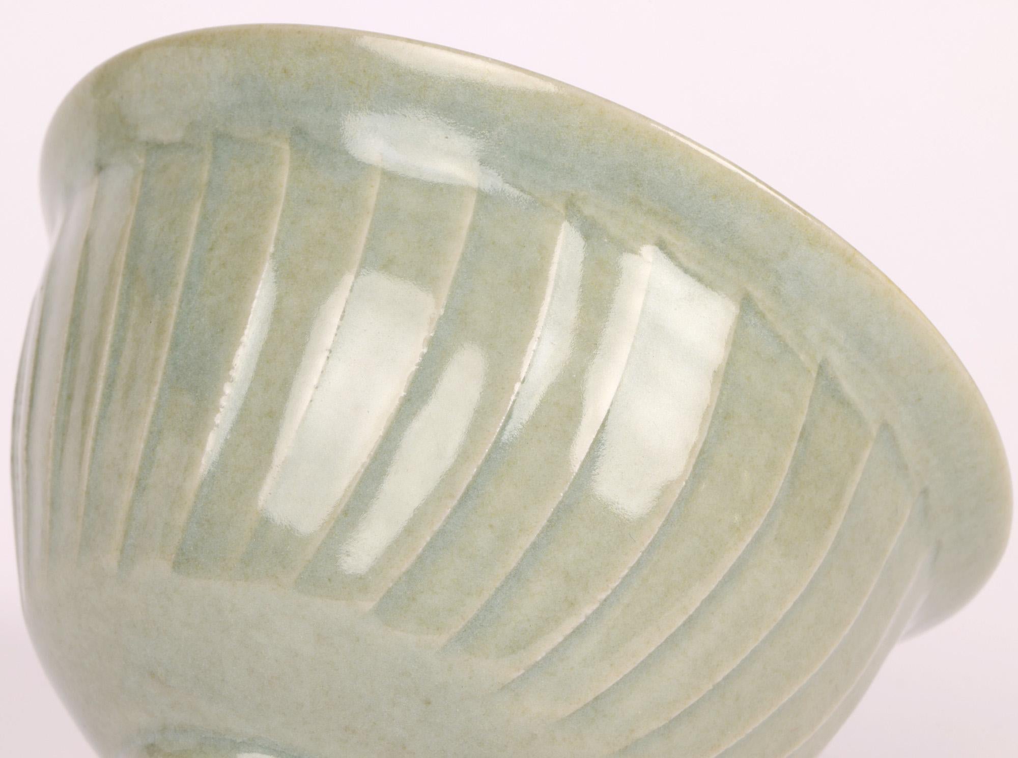 A very fine Lowerdown Pottery celadon glazed porcelain bowl by renowned potter David Leach OBE (British, 1911-2005) and dating from around 1987. 

David Leach, the son of the highly acclaimed potter Bernard Leach worked at the Leach Pottery under