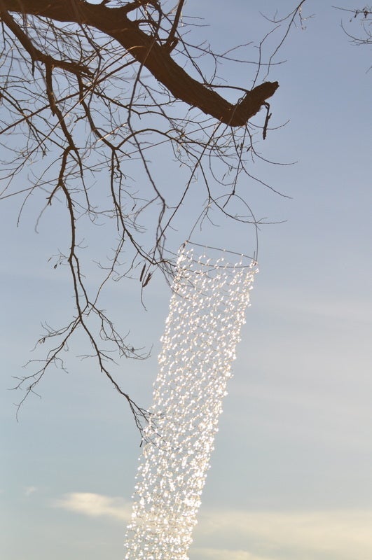 Blowing in the Wind, Long Hanging Chain Sculpture of Clear Torch Worked Glass - Brown Abstract Sculpture by David Licata