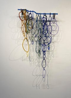 Untitled, Hanging Sculpture of Torch-Worked Glass in Blue, Orange Circular Loops