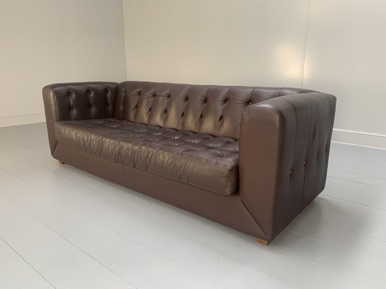 This is a superb David Linley “Yoxford” 3-seat Modern-Chesterfield Sofa, dressed in a luxurious, top-grade Brown Leather and with Walnut detail.

In a world of temporary pleasures, Linley create beautiful furniture built to last a