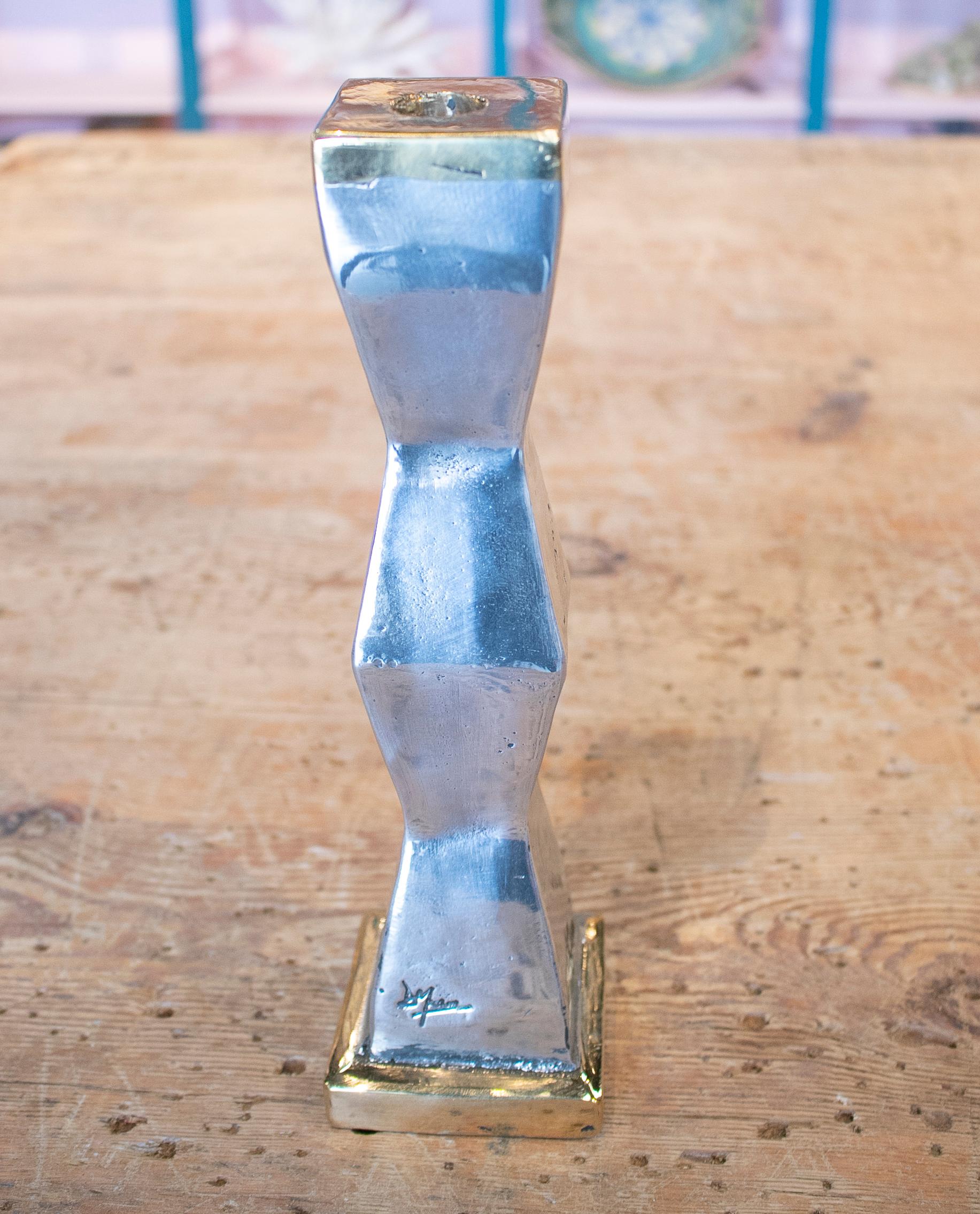 David Marshal two-tone silvered and gilt bronze candlestick, 1980.