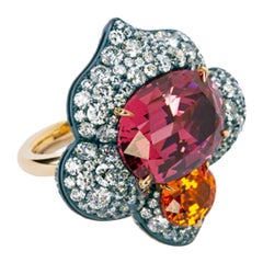 David Michael Ring aus Gold und Silber mit rosa Spinell und Granat