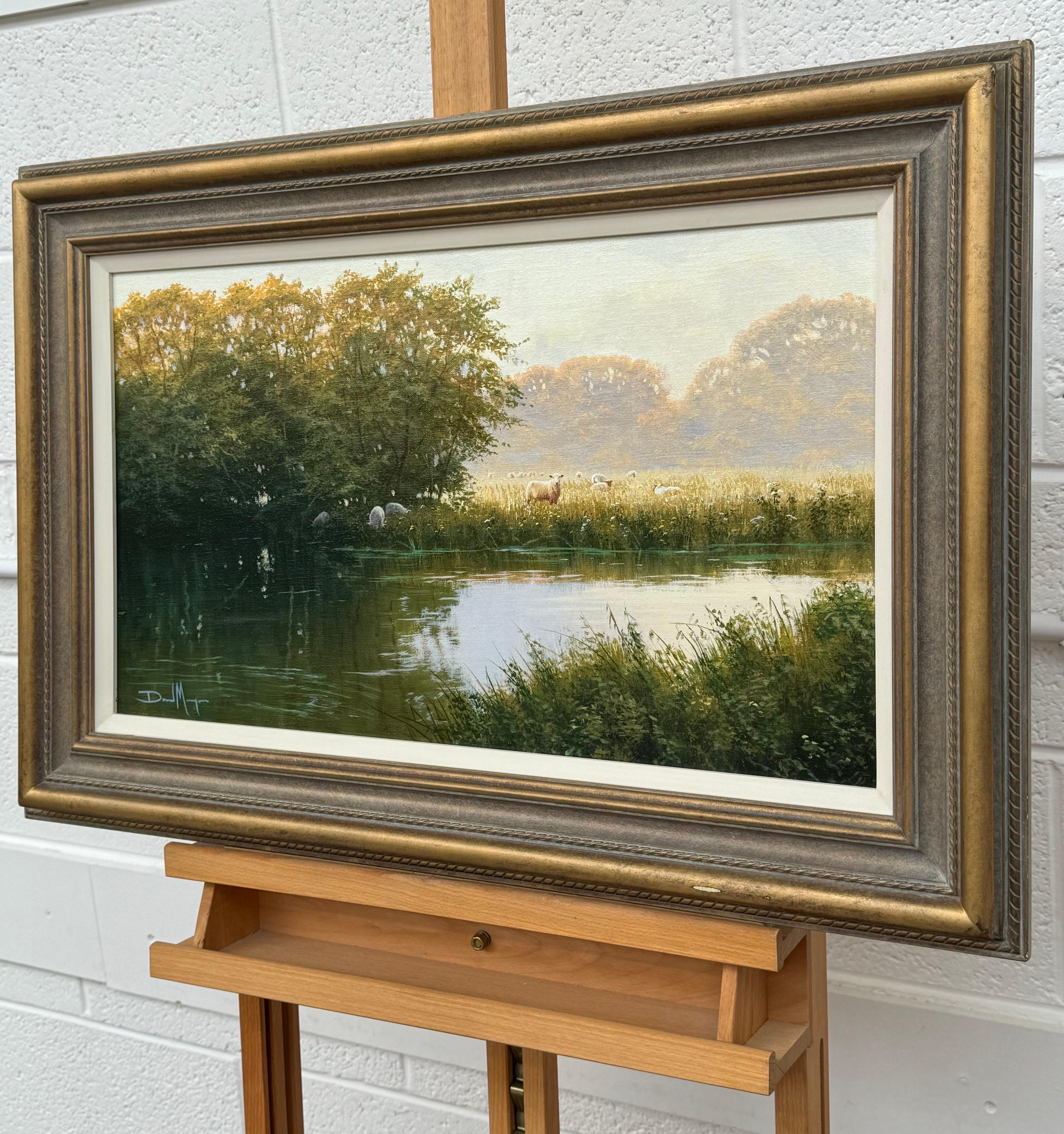 Scène de paysage fluvial avec moutons dans la campagne anglaise par un artiste anglais - Marron Landscape Painting par David Morgan