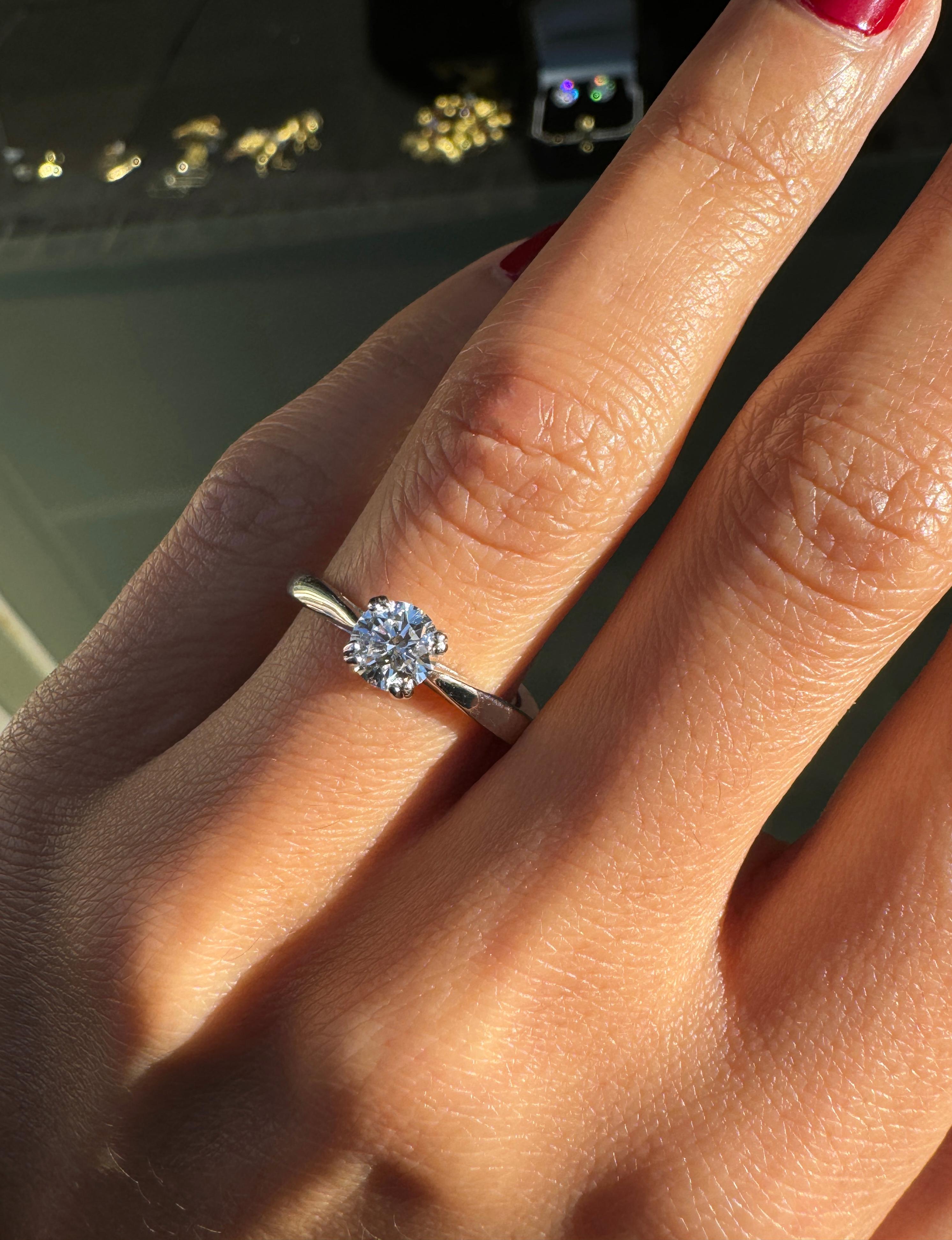 Brilliant Cut David Morris 0.57ct F VS1 Diamond Platinum Solitaire Engagement Ring For Sale