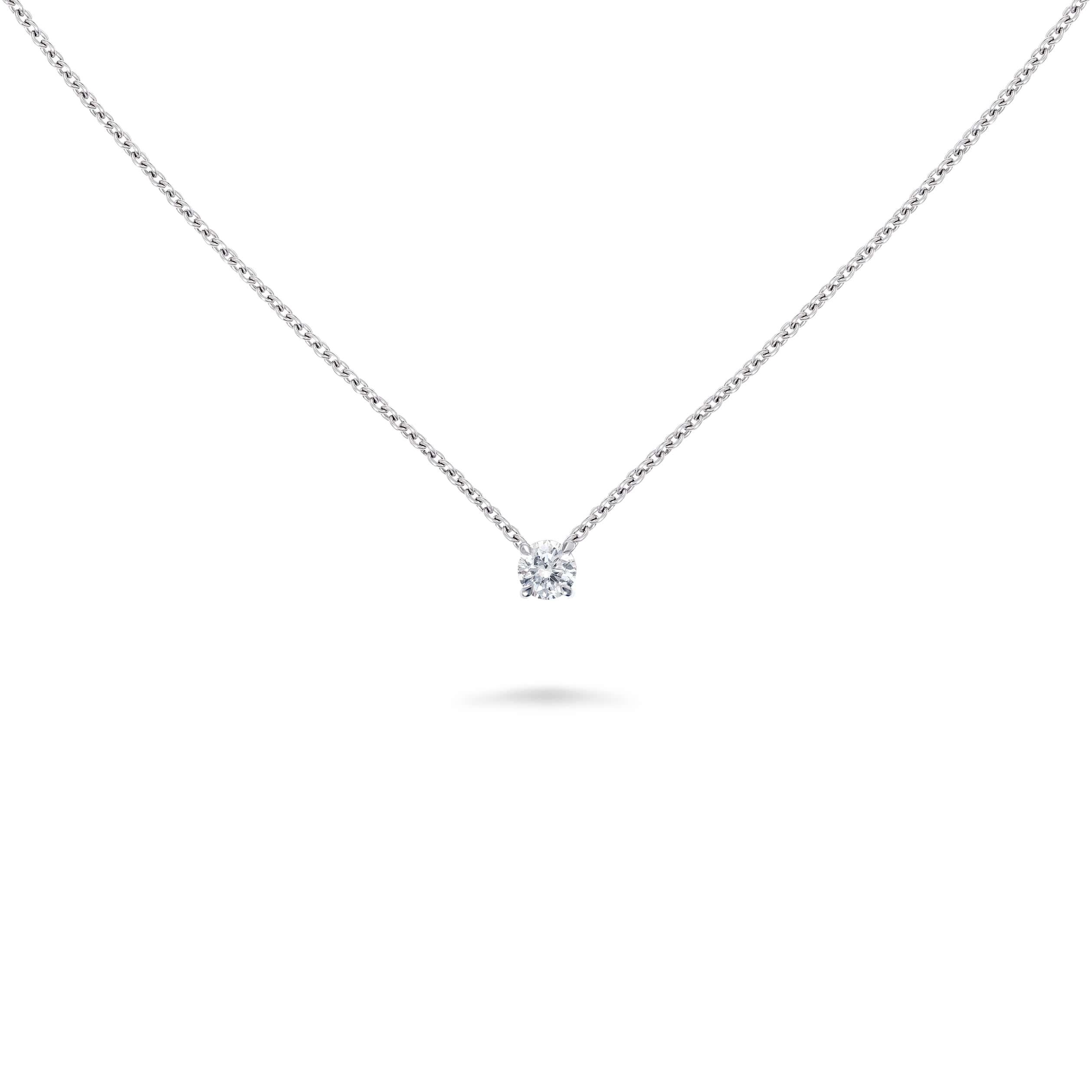 Experience timeless elegance with the exquisite 0.30 Carat round brilliant White Diamond Pendant by David Morris London. Crafted to perfection, this pendant exudes sophistication and grace. Set in an elegant 18ct white gold setting, the pendant sits
