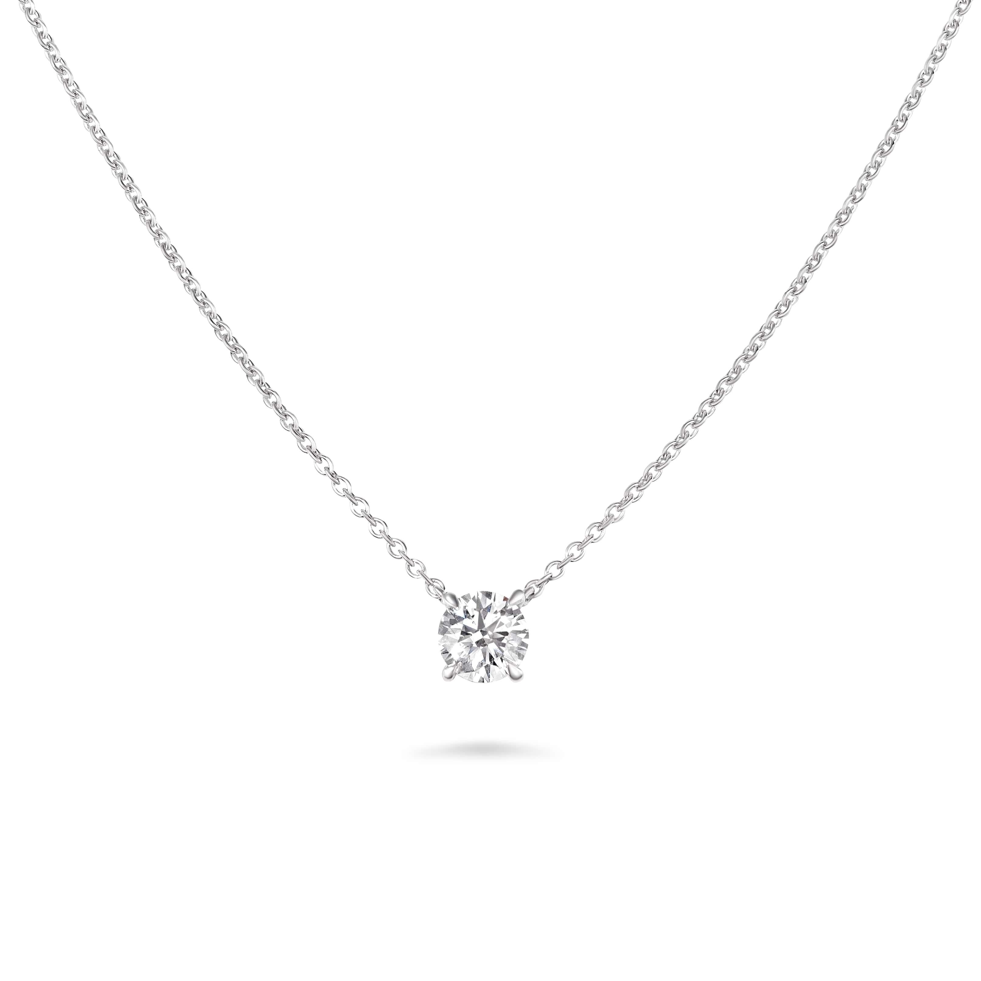 The pendant's design encapsulates modern grace, allowing the diamond's luminosity to take centre stage while exuding an air of understated opulence. The 18ct white gold chain further enhances the necklace's allure, draping delicately around the neck