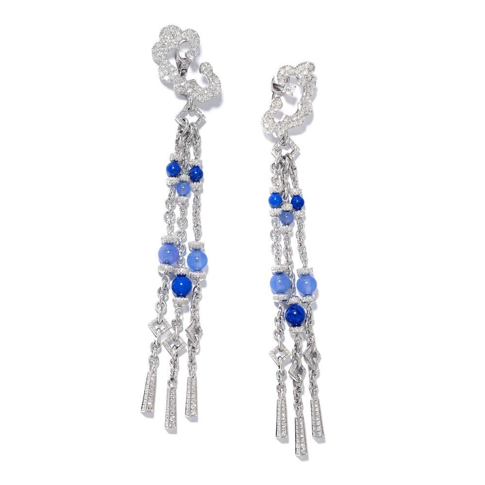 Inspired by the ‘tree of life’ that represents new life and beginnings, these white diamond tassel earrings feature an abstract interpretation of the recognisable tree silhouette, set with scintillating white diamonds. 

Hanging from the tree are