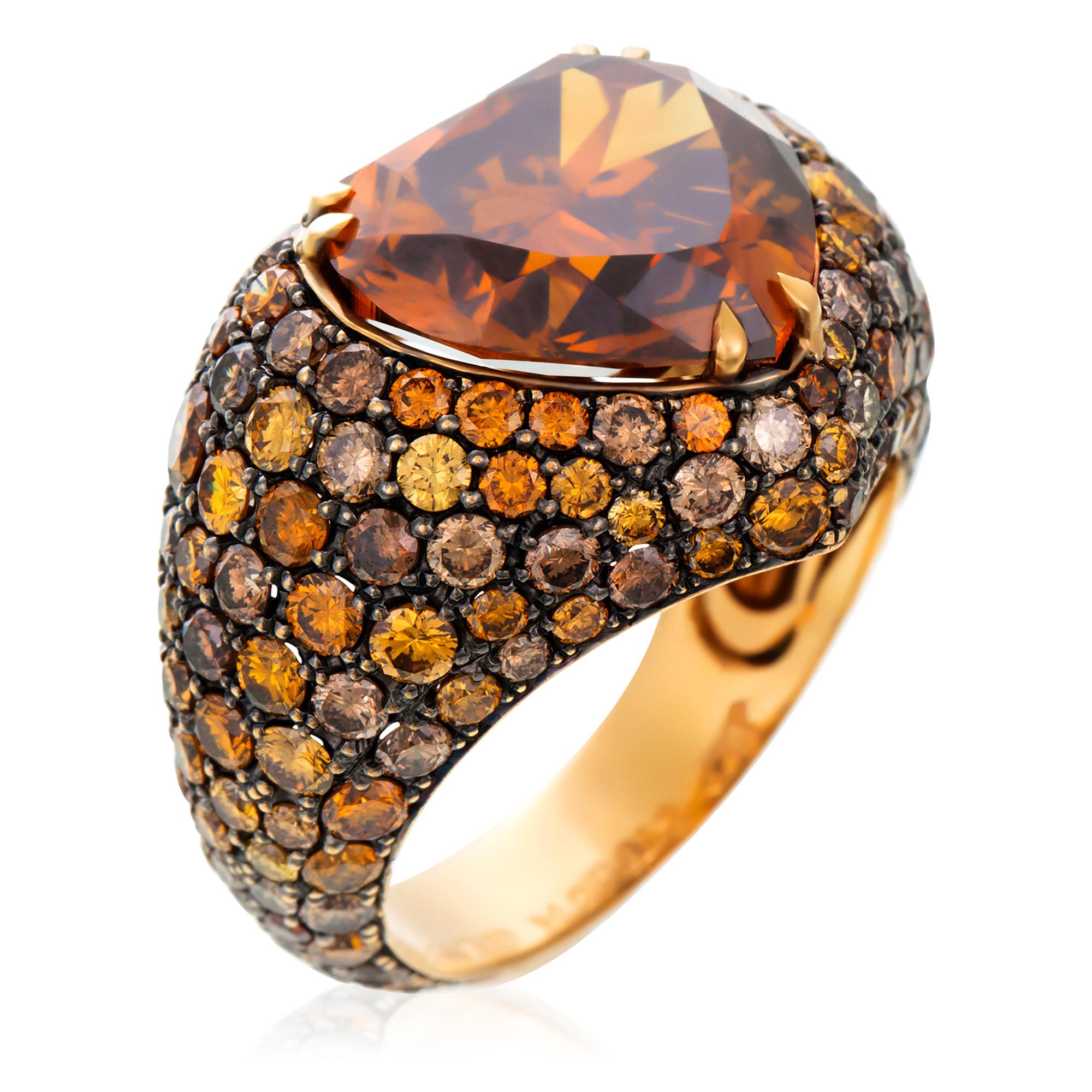 Contemporary design meets vintage appeal in this eye-catching, heart-shaped diamond cocktail ring from London jeweller David Morris. At the ring’s centre is an exceptional, fancy orange-brown diamond in an unusual heart-shaped cut and striking