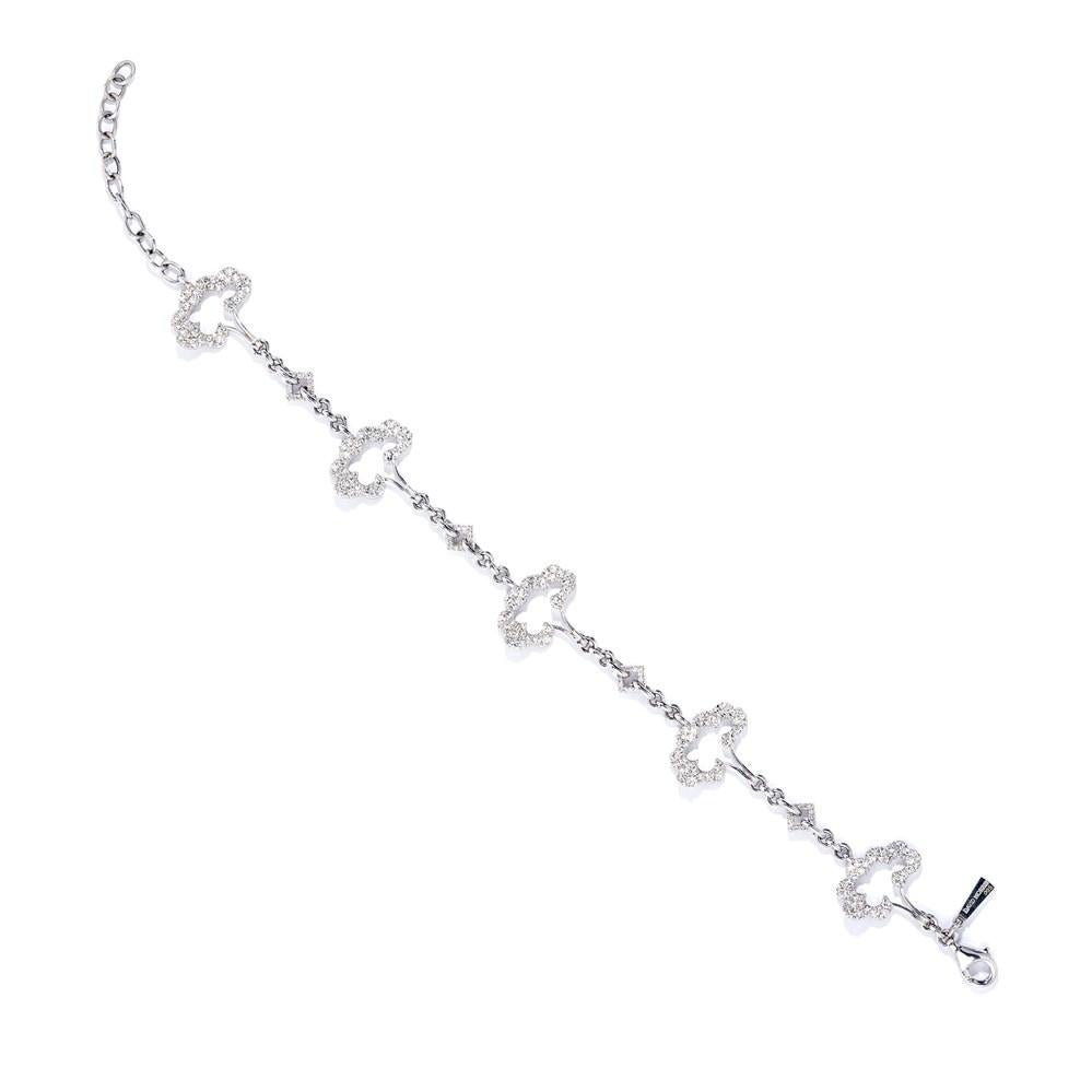 This delicate white diamond bracelet from David Morris draws its design inspiration from the fabled Tree of Life, a powerful symbol of renewal that is found in cultures throughout the world.


The bracelet’s dainty white gold links are interspersed