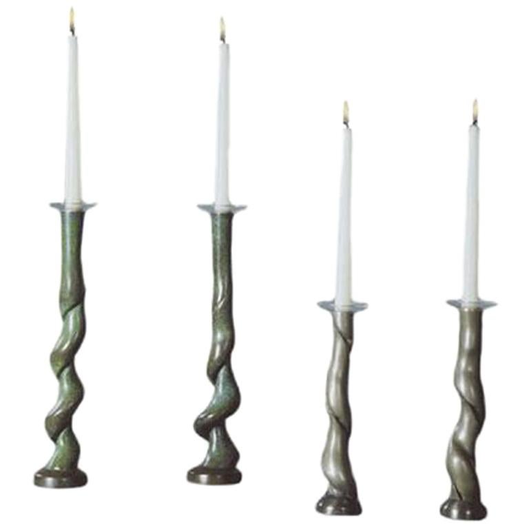 David N. Ebner Four Cast Bronze Candleholders