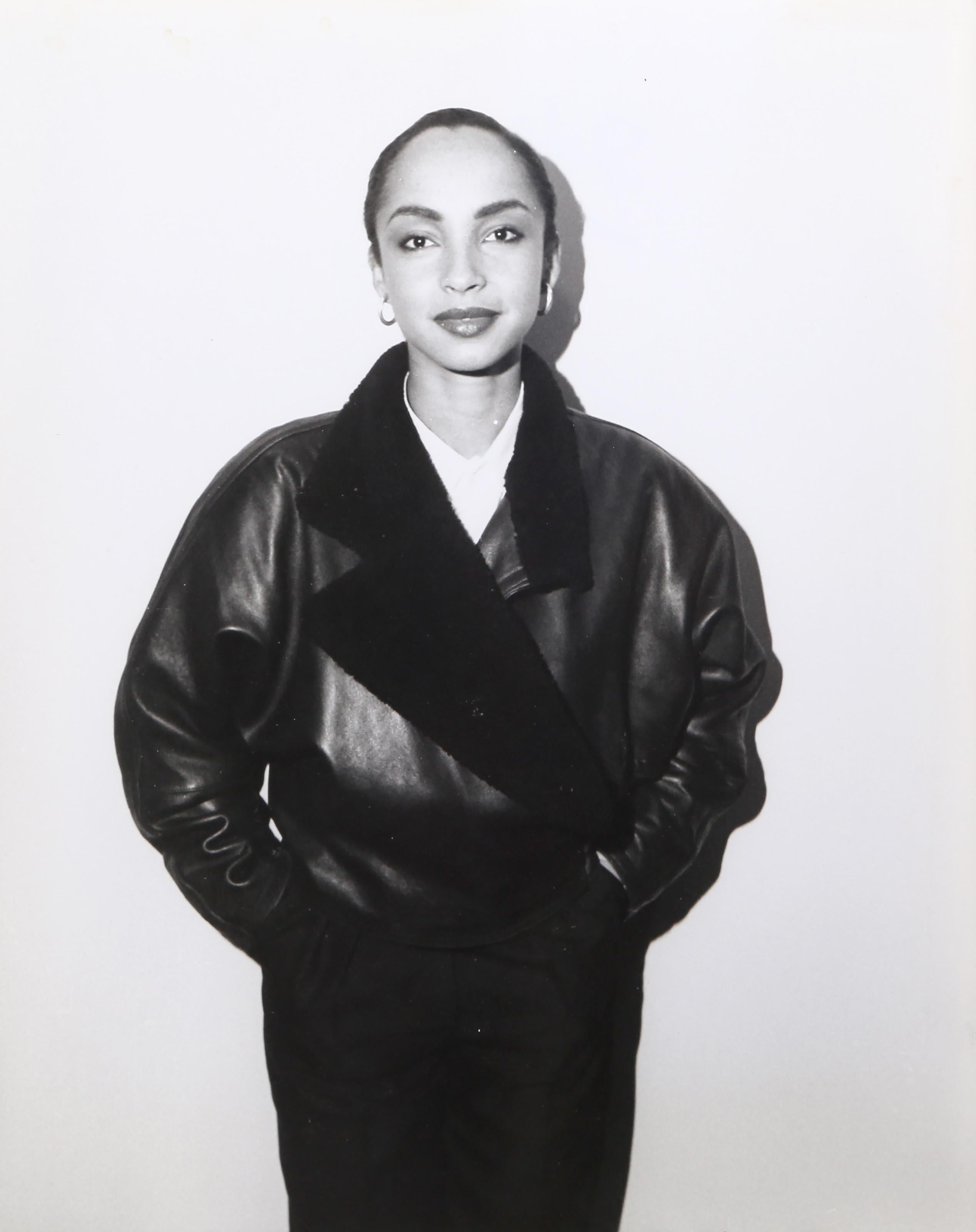 David Ogburn, American (1942 - ) - Sade Adu, Medium:  Gelatin Silver Print, Size:  10 x 8 in. (25.4 x 20.32 cm)
