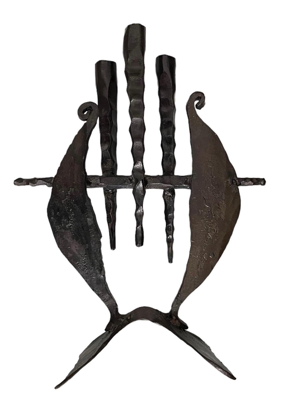Hand Forged Iron Sconce Candelabra 
Holocaust Memorial Judaic table Sconce Sculpture


David Palombo was an Israeli sculptor and painter. He was born in Turkey to a traditional family and immigrated to the Land of Israel with his parents in 1923.