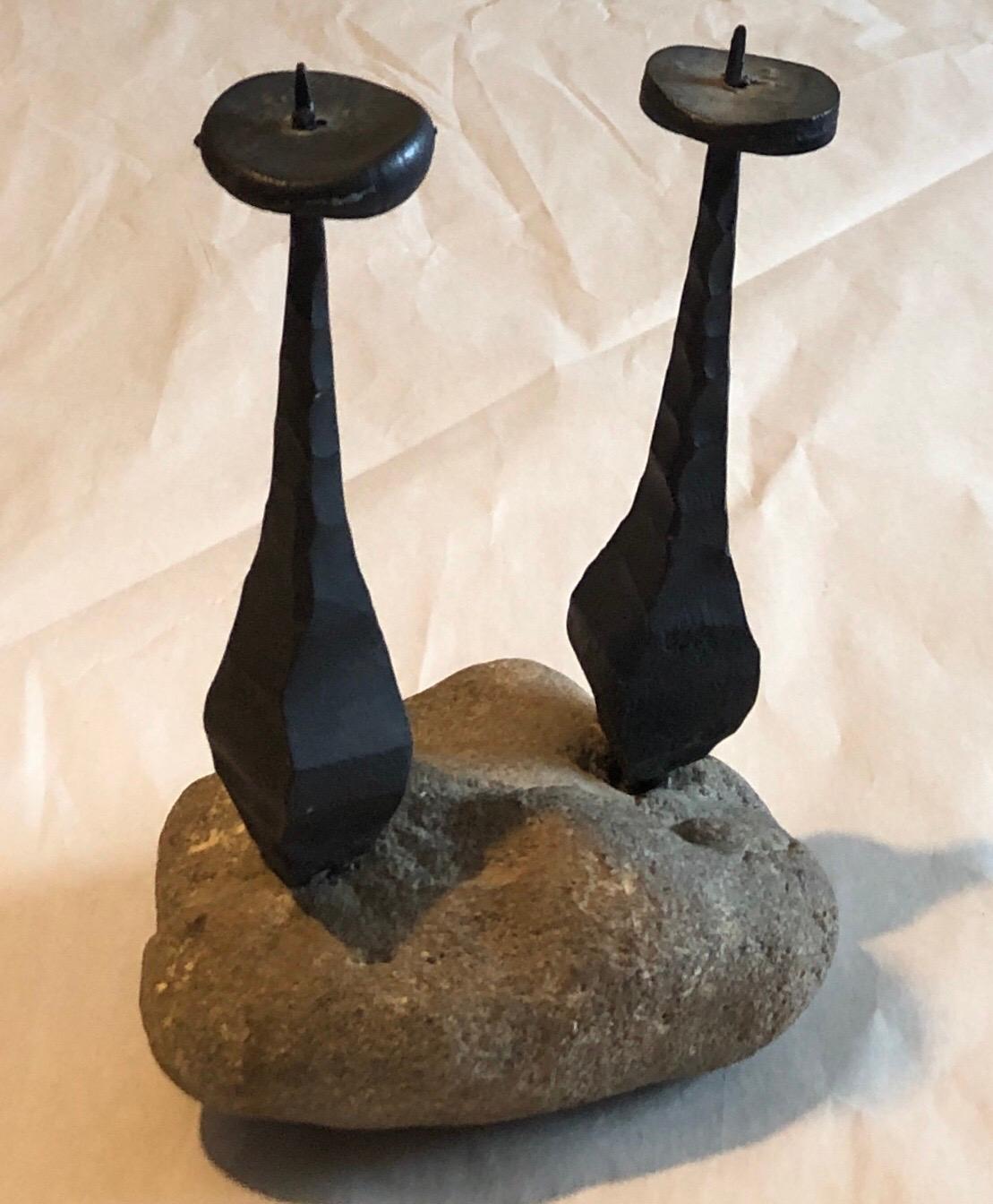 Hand Forged Iron and Stone two light Candelabra 
 Judaica Menorah Sculpture
measurements are approximate.

David Palombo was an Israeli sculptor and painter. He was born in Turkey to a traditional family and immigrated to the Land of Israel with his