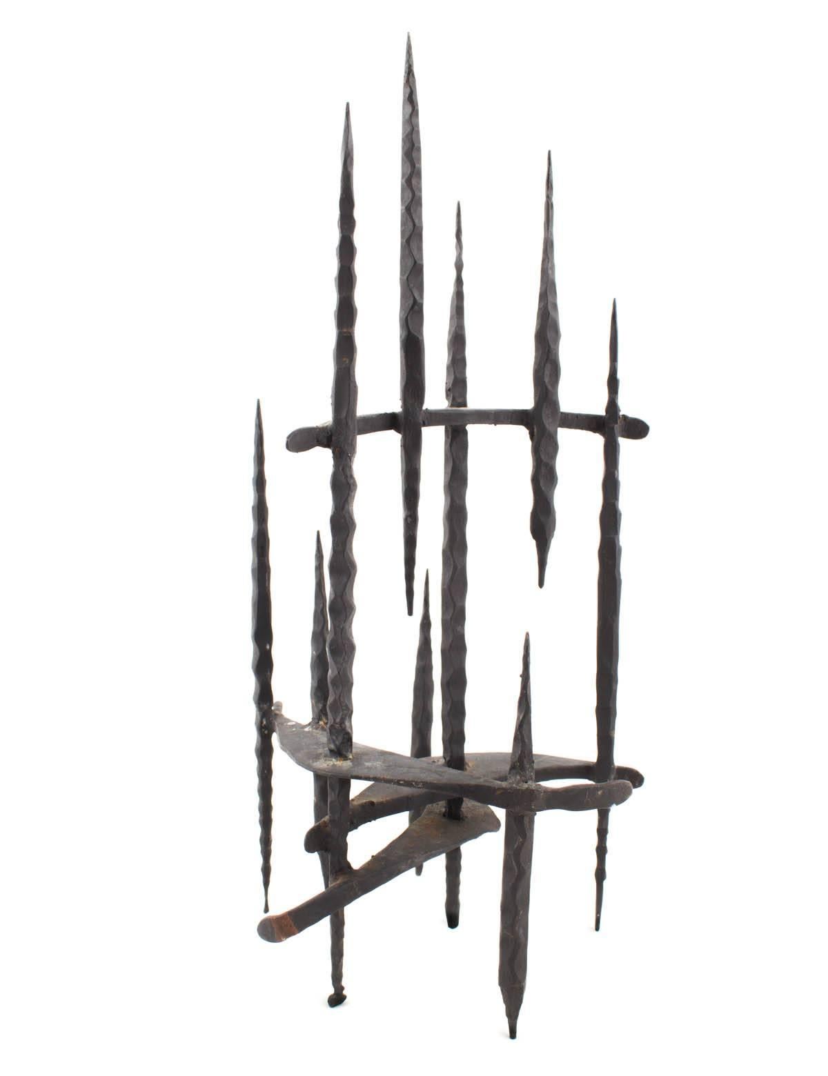 Hand Forged Iron Candelabra 
Holocaust Memorial Judaic Menorah Sculpture


David Palombo was an Israeli sculptor and painter. He was born in Turkey to a traditional family and immigrated to the Land of Israel with his parents in 1923. They lived in