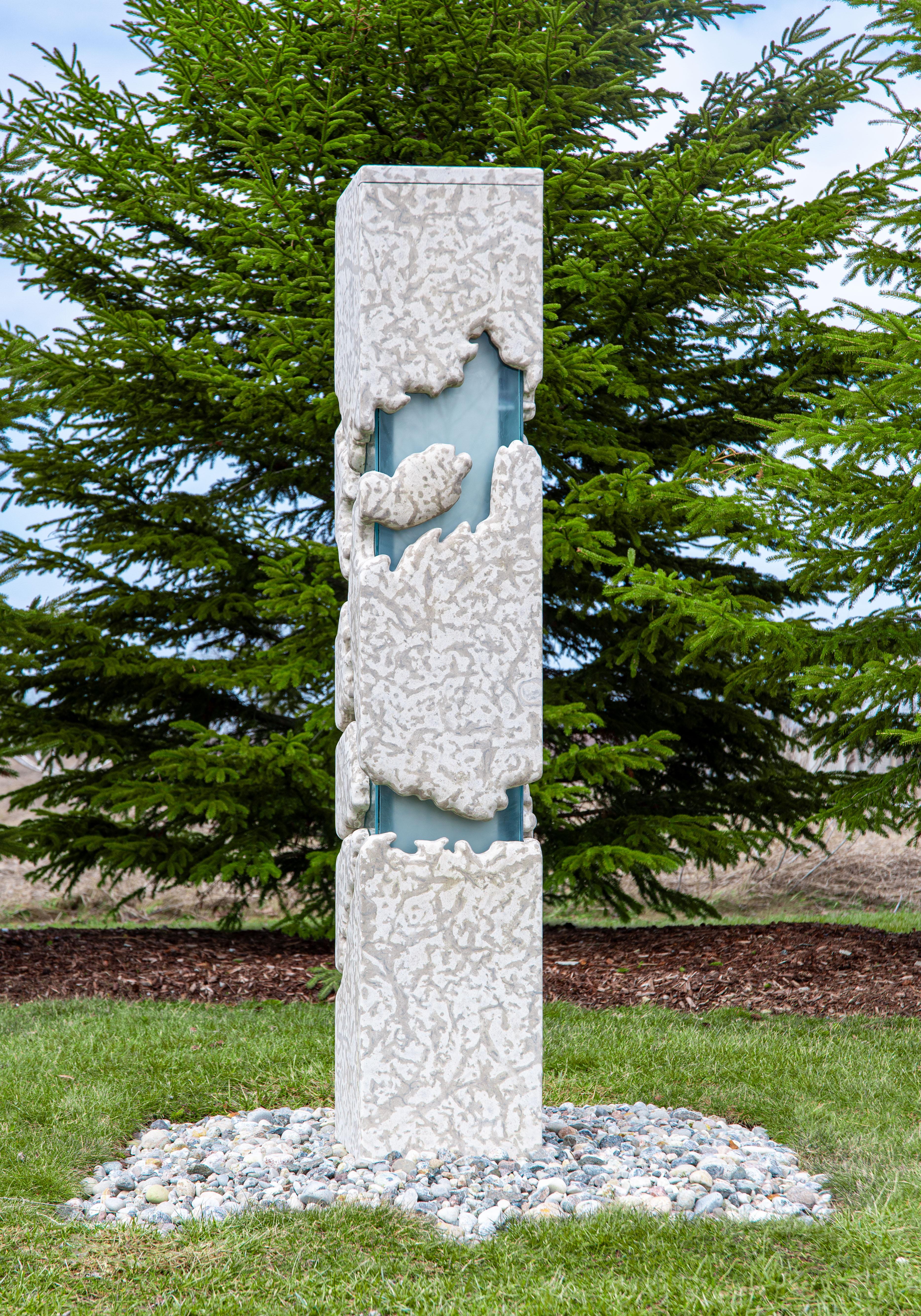 This monolithic contemporary stone and glass sculpture lights up at night.

The rugged beauty of David Perrett’s sculptural work has found a place in many notable public collections. The Hamilton-based artist became captivated by the rocky Canadian
