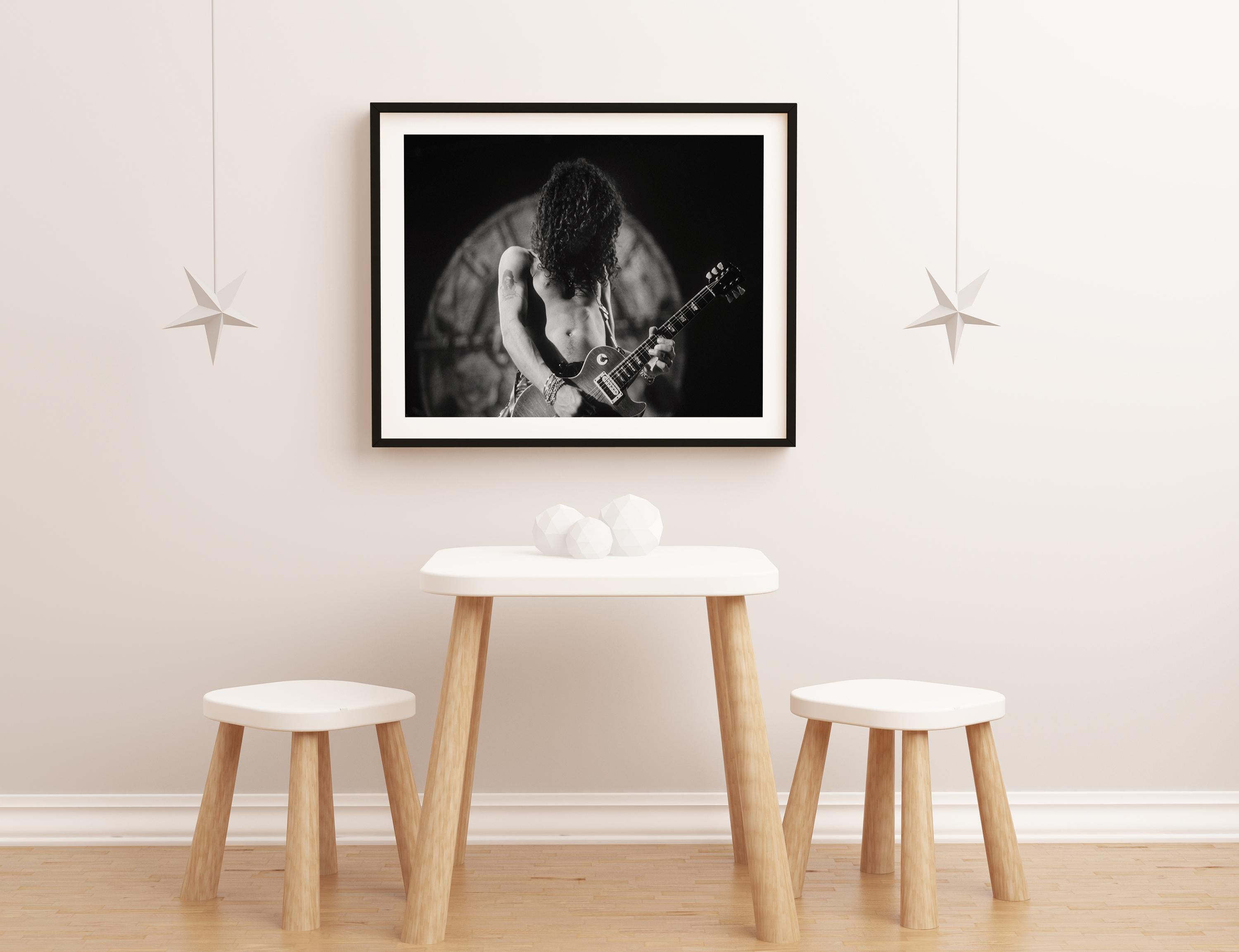 Captivating Portrait of Slash on Stage Fine Art Print - Black Black and White Photograph by David Plastik