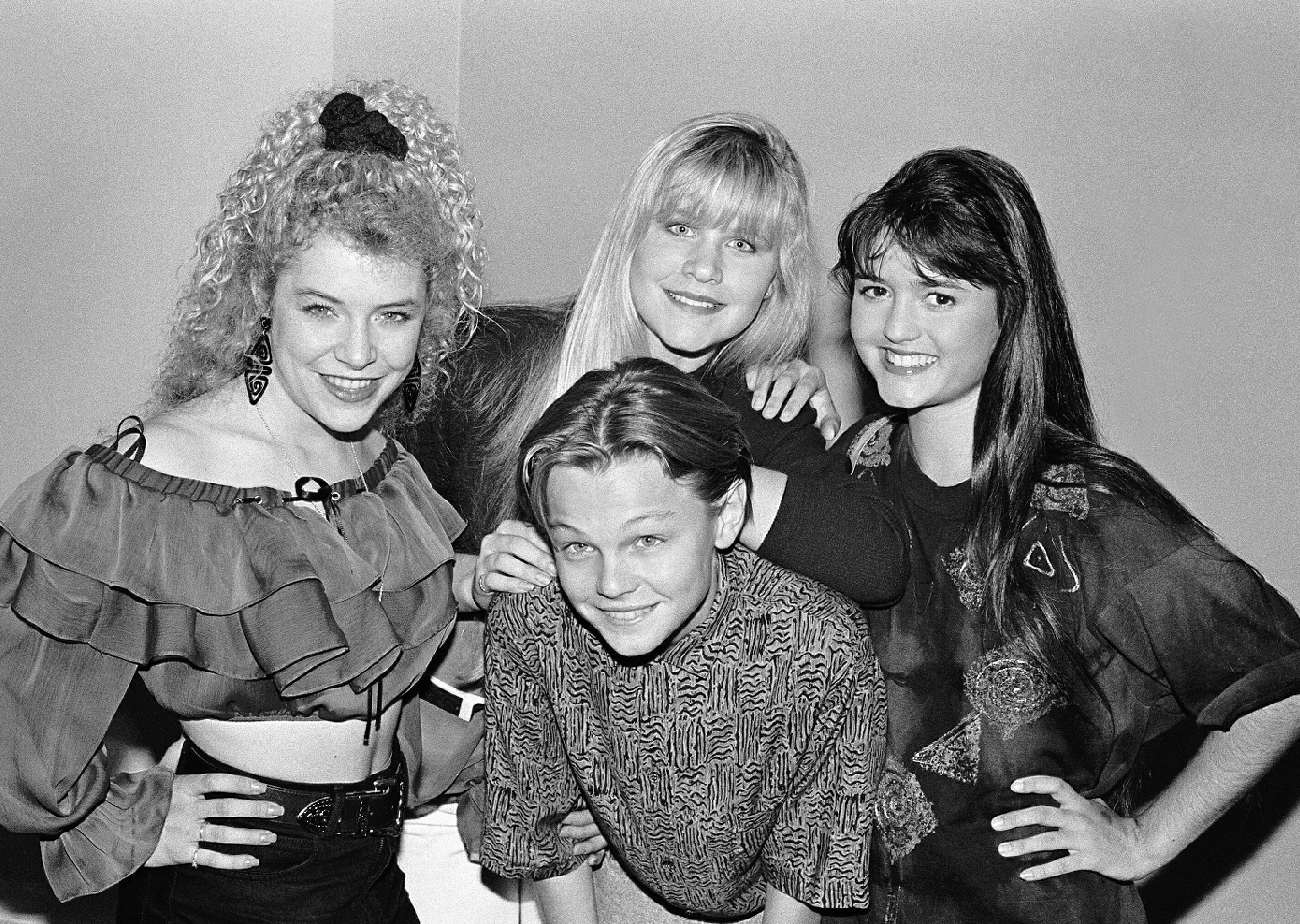 David Plastik Black and White Photograph - Young Leonardo DiCaprio Surrounded by Girls Fine Art Print