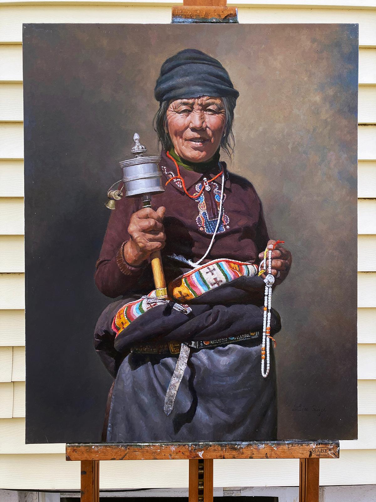 <p>Artist Comments<br>A Tibetan woman holding a prayer wheel and beads radiates quiet devotion. Painted in a classical realist style, the layers of multi-step glazing and subtle tonal transitions lend luminous depth to the composition. The portrait