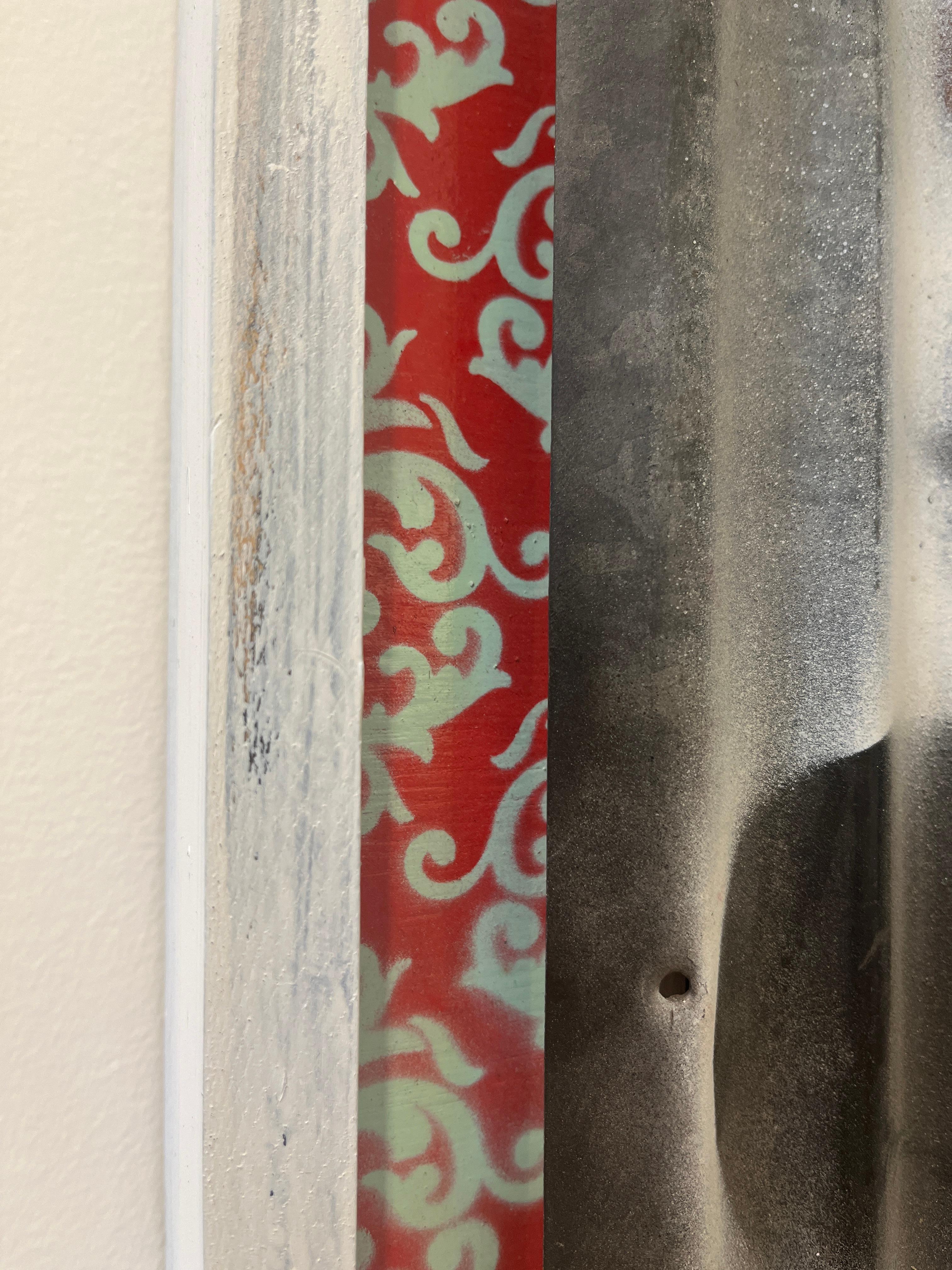 During street fighting in Ramadi and Fallujah, Iraq, Richardson noted the impact of stray gunfire and its decaying effect on the city. One particular memory he has is of a plywood sign featuring the figure of a man hoisting a barbell over his head,
