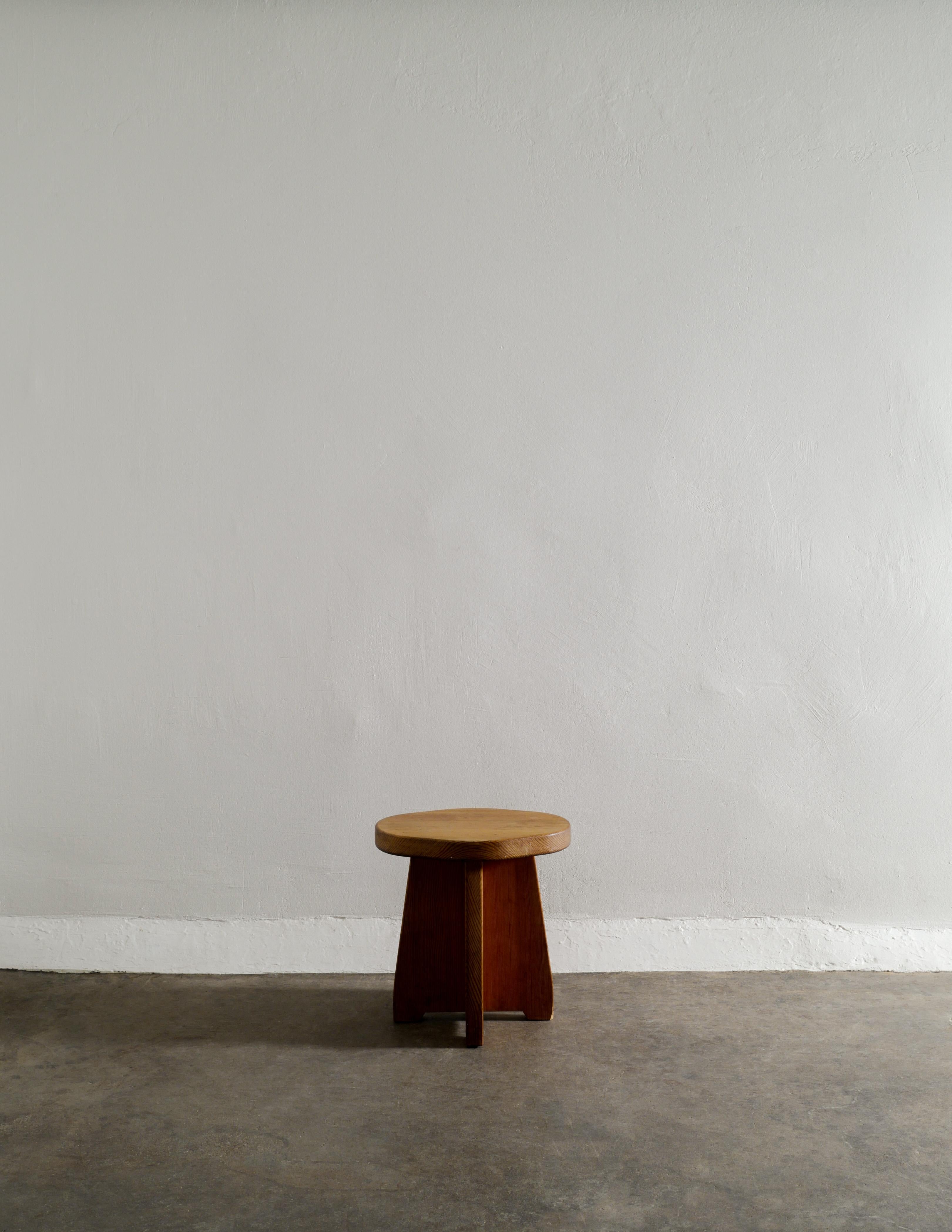 Very rare stool in solid stained pine designed by David Rosén and produced by Nordiska Kompaniet Sweden in the 1930s. In good vintage and original condition with patina from age and use. Goes well together with other classic and iconic mid-century