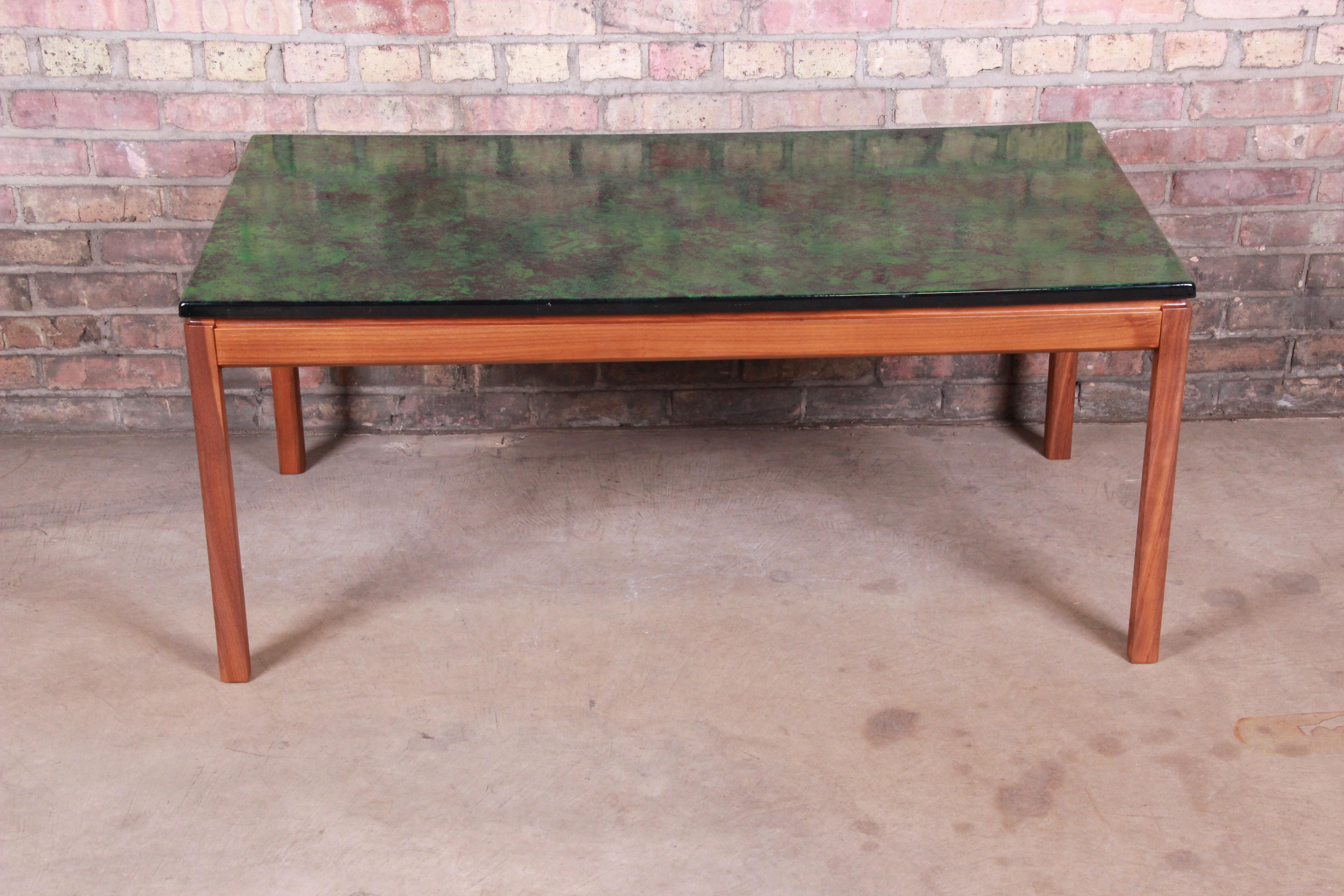 A rare and exceptional midcentury Swedish Modern coffee or cocktail table

By David Rosén and Algot P. Torneman for Nordiska Kompaniet

Sweden, 1968

Solid teak base, with handmade enamel top.

Measures: 47.25