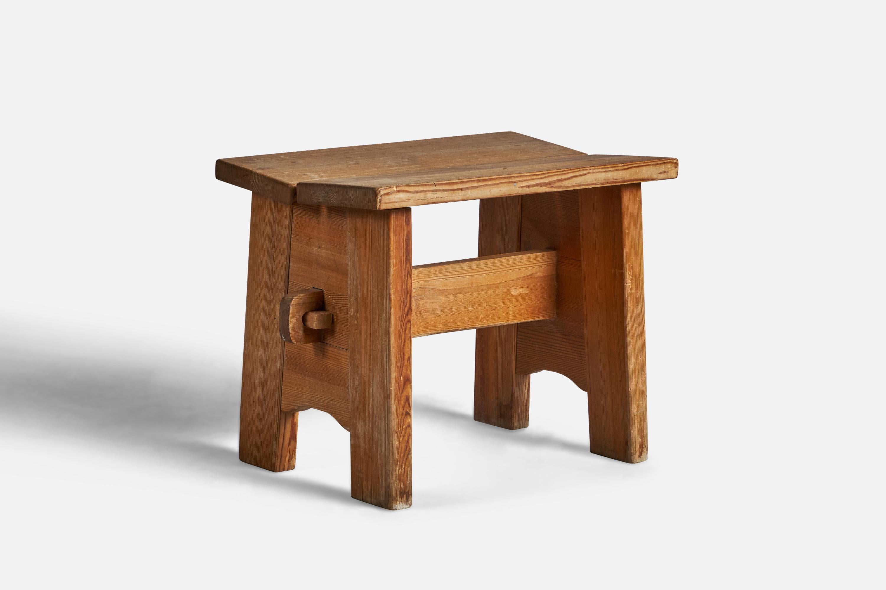 A solid pine stool, designed by David Rosén and produced by Nordiska Kompaniet, c. 1940s.

