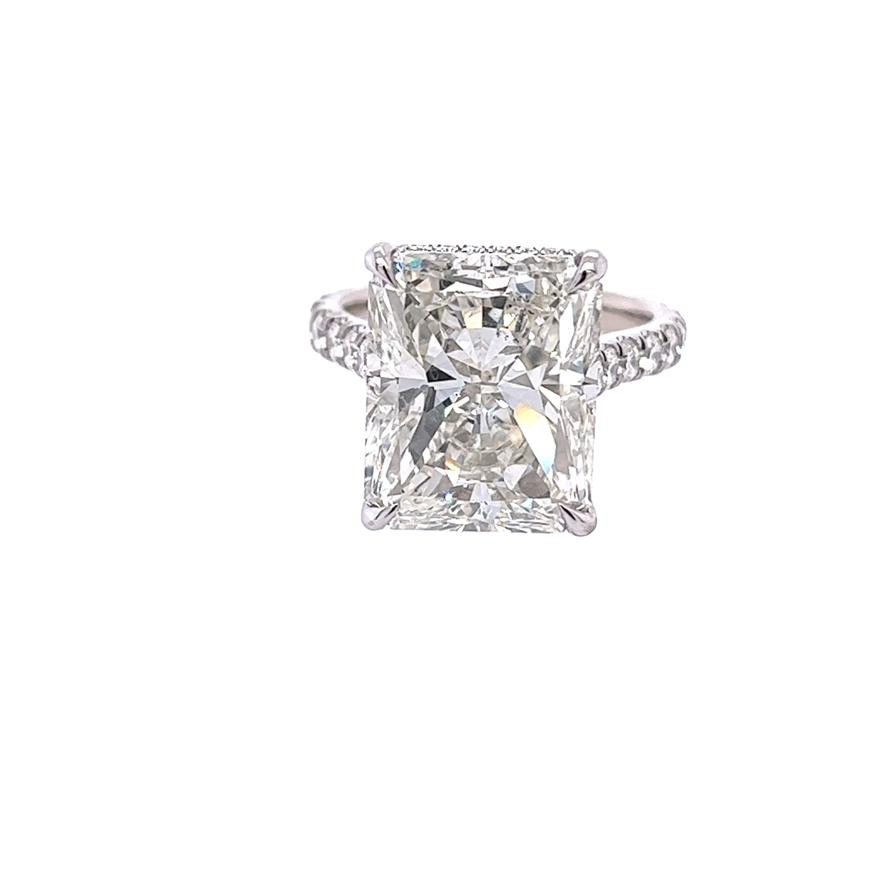 Rosenberg Diamonds & Co. 10.09 carat Radiant cut I color SI1 clarity is accompanied by a GIA certificate. This Exceptional elongated Radiant cut is full of brilliance and it is set in a handmade platnium setting. This ring continues its elegance