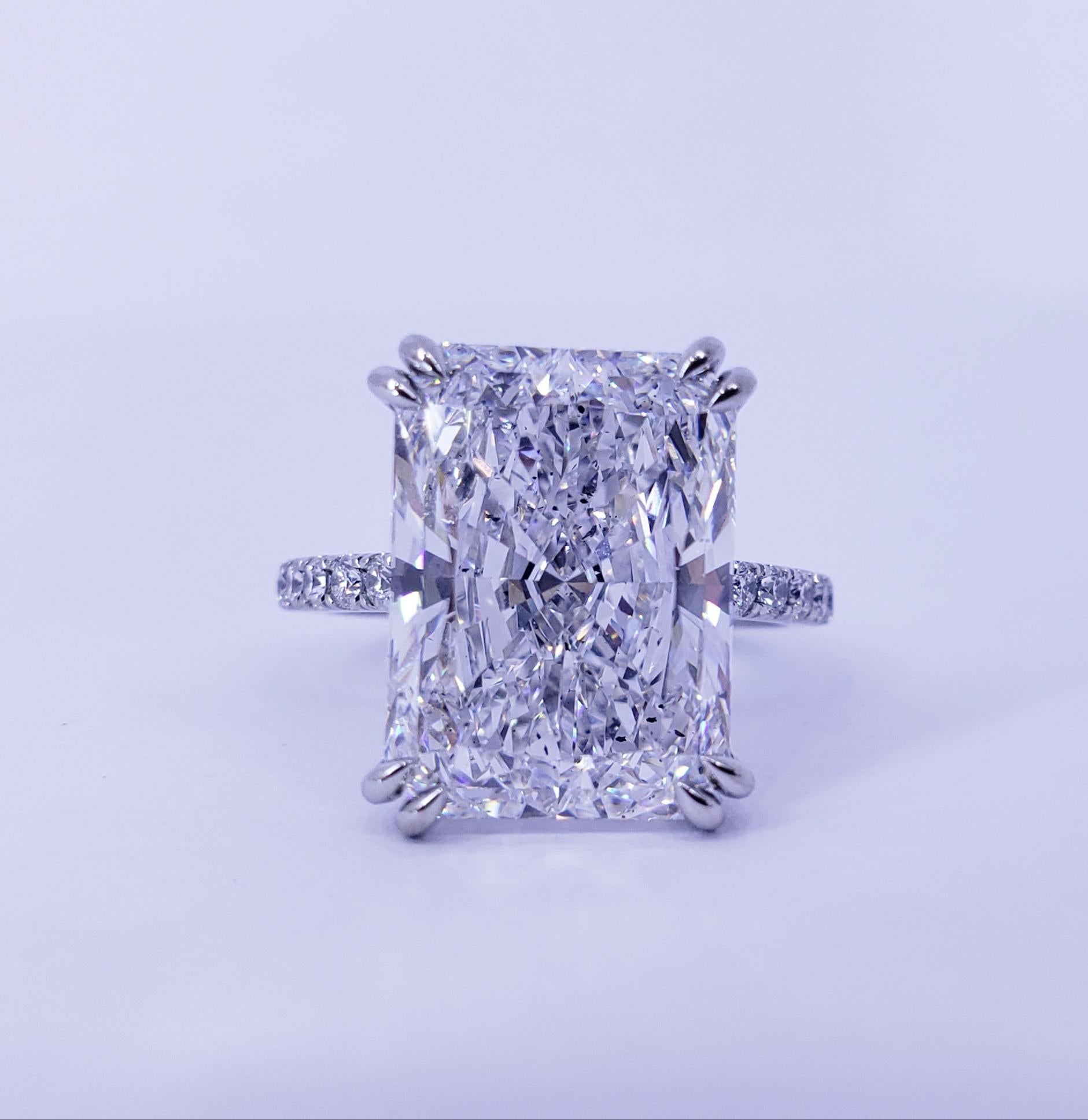 Rosenberg Diamonds & Co. 10.19 carat Radiant shape D color SI2 clarity is accompanied by a GIA certificate. This breathtaking Radiant is full of brilliance and an exceptional SI2 and it is set in a handmade platinum setting and continues its