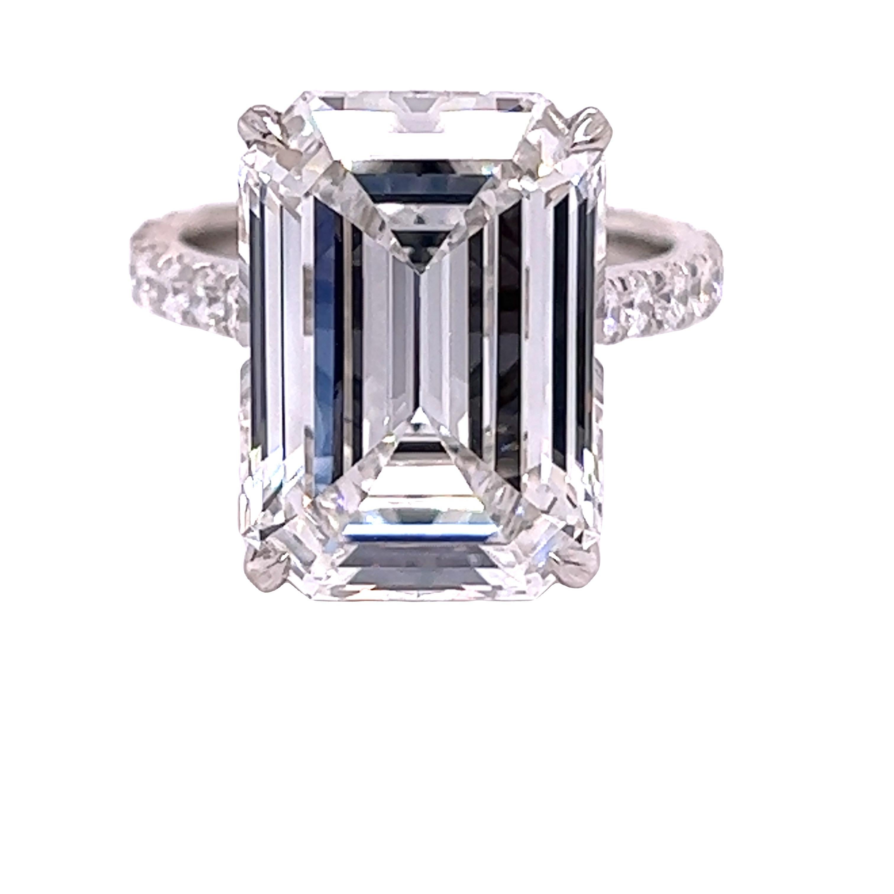 Rosenberg Diamonds & Co. 10.41 carat Emerald cut F color VVS2 clarity is accompanied by a GIA certificate. This breathtaking Emerald is full of brilliance and it is set in a handmade platinum setting and continues its elegance with a row of micro