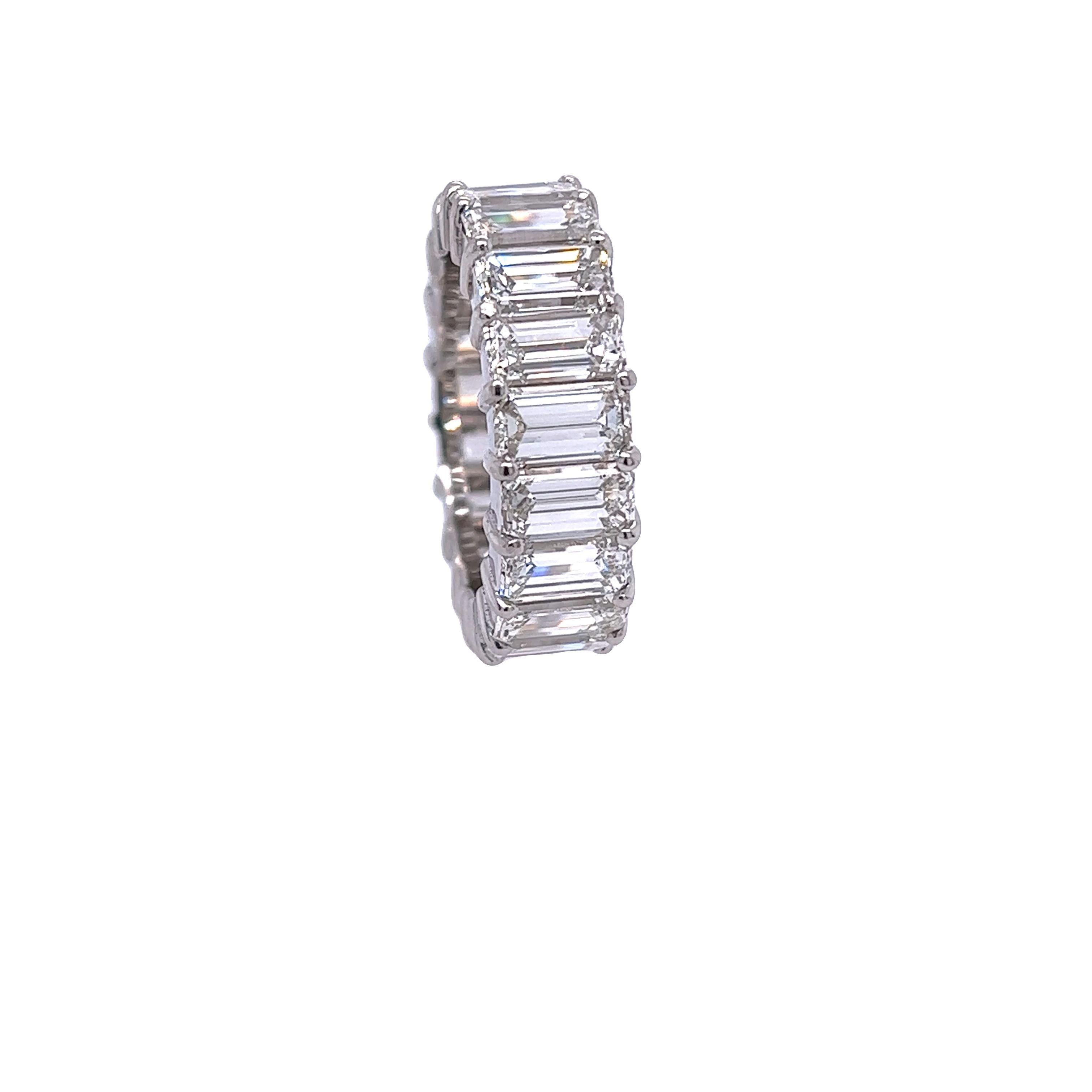 Rosenberg Diamonds & Co. 10.45 total carat weight Emerald cut diamond eternity band. This beautiful platinum eternity band has nineteen emerald shape diamonds ranging from G-H in color VS2 - VVS in clarity with a half a carat each stone designed by
