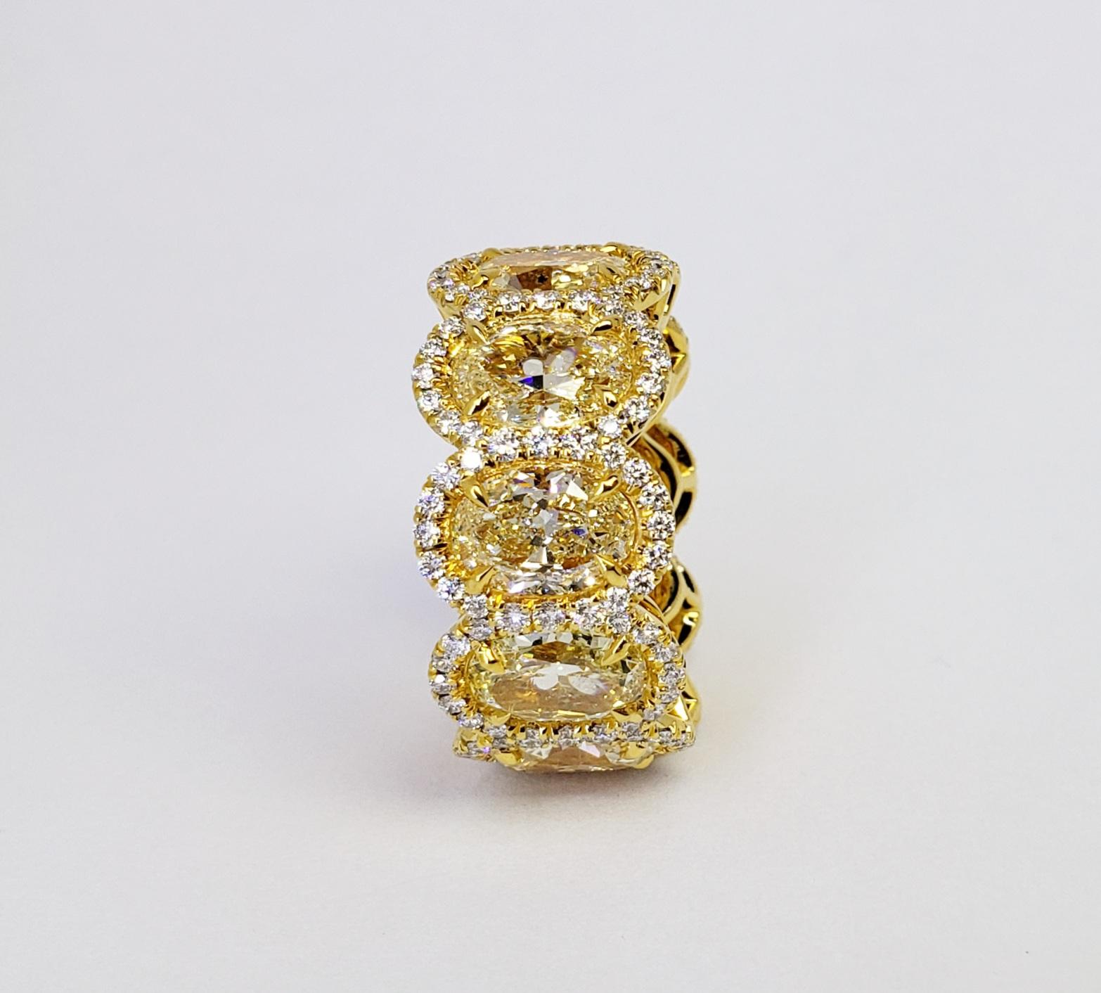 Rosenberg Diamonds & Co. 10.64 total carat weight Oval shape Light Yellow – Fancy Light Yellow SI1 – VVS1 clarity. This beautiful Yellow Oval diamond eternity band is set in 18 karat yellow gold, with ten Oval diamonds each stone weighing just over