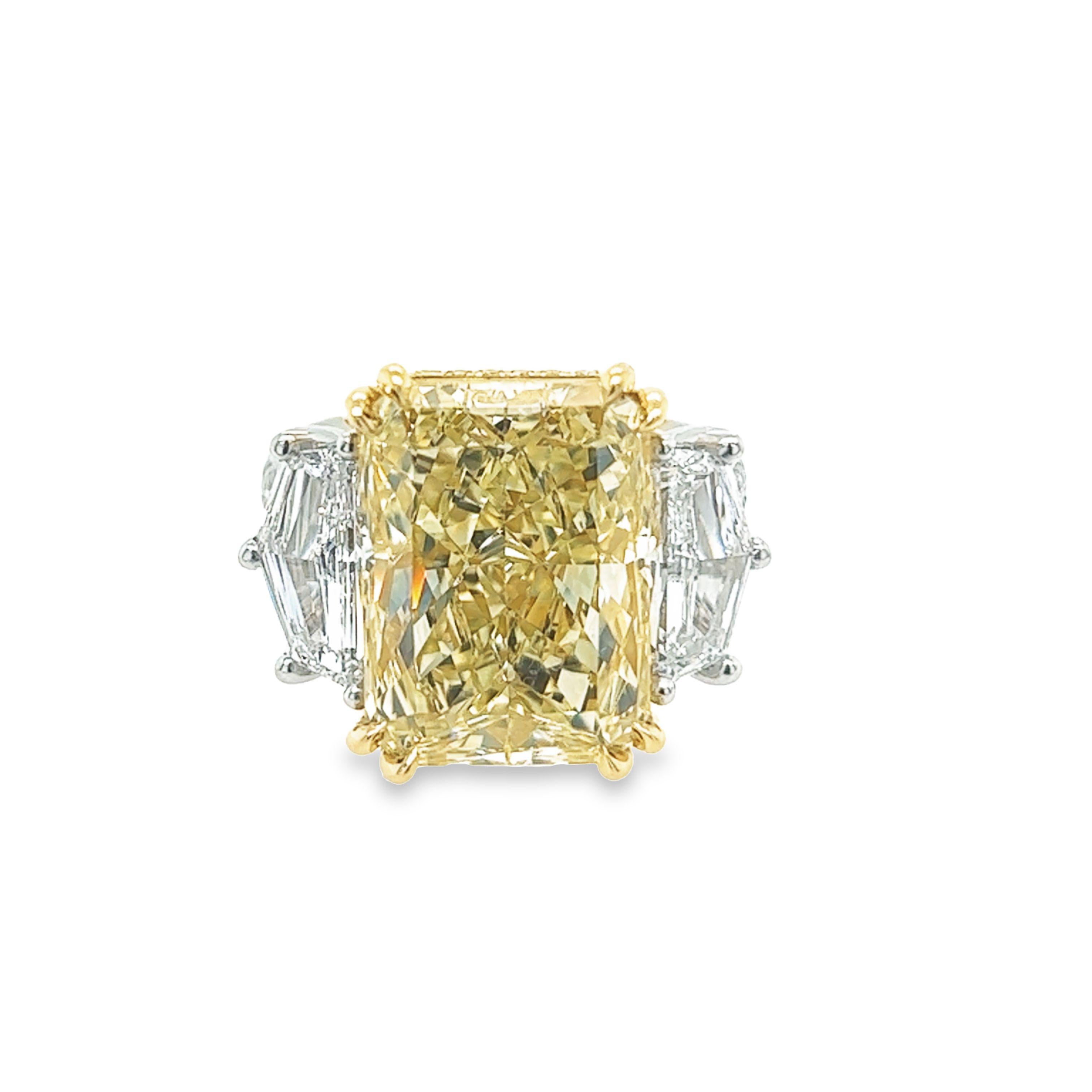 Rosenberg Diamonds & Co. 11.18 carat Radiant Cut Fancy Light Yellow VVS2 clarity is accompanied by a GIA certificate. This extraordinary radiant cut is set in a handmade platinum & 18k yellow gold setting with perfectly matched pair of epaulette