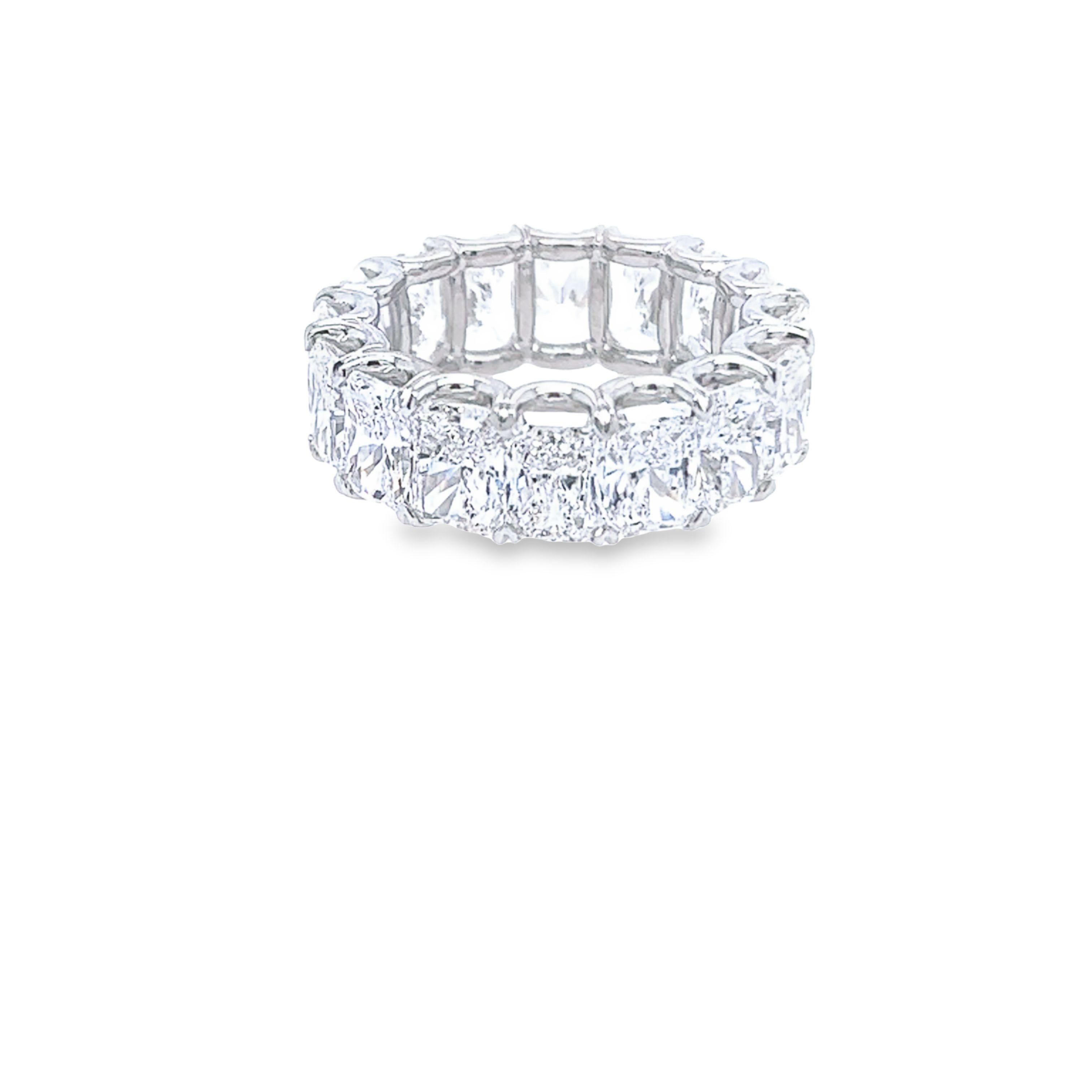 Rosenberg Diamonds & Co. 11.31 total carat weight Radiant cut diamond eternity band. This beautiful platinum eternity band has sixteen elongated radiant cut diamonds ranging from E-G in color SI1-VS in clarity with an average of just under a carat