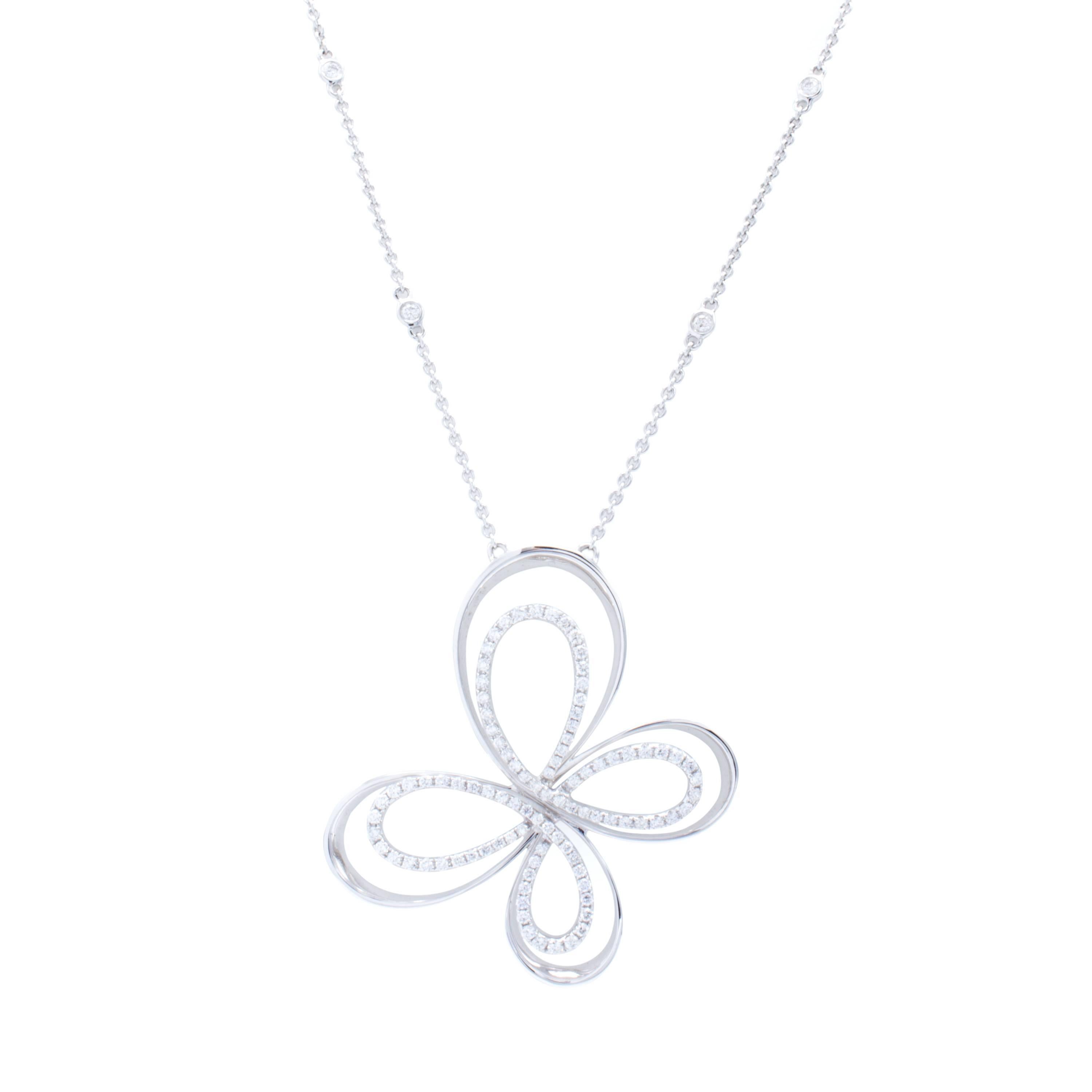 An elegant butterfly pendant shines with 1.15 carats of glittering round brilliant white pave diamonds. The motif is crafted beautifully to float lifelike upon a diamonds by the yard style necklace of 18Kt white gold. Designed by David