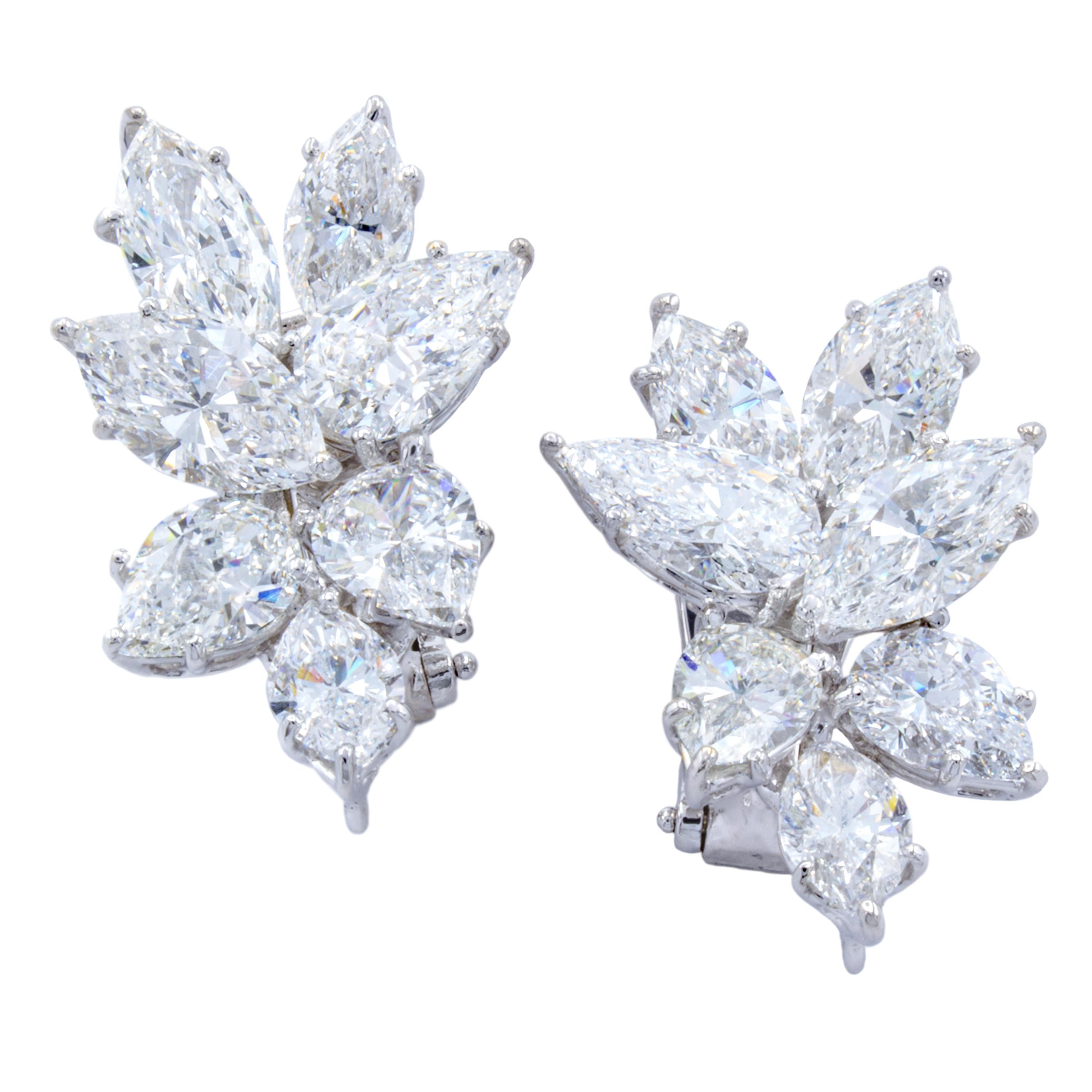 Rosenberg Diamonds & Co. 11.60 total carat weight cluster earrings. These magnificent light weight earrings gently hug the ear to make the perfect addition to any evening wear featuring six Pear & eight marquise shape diamonds ranging from E – G