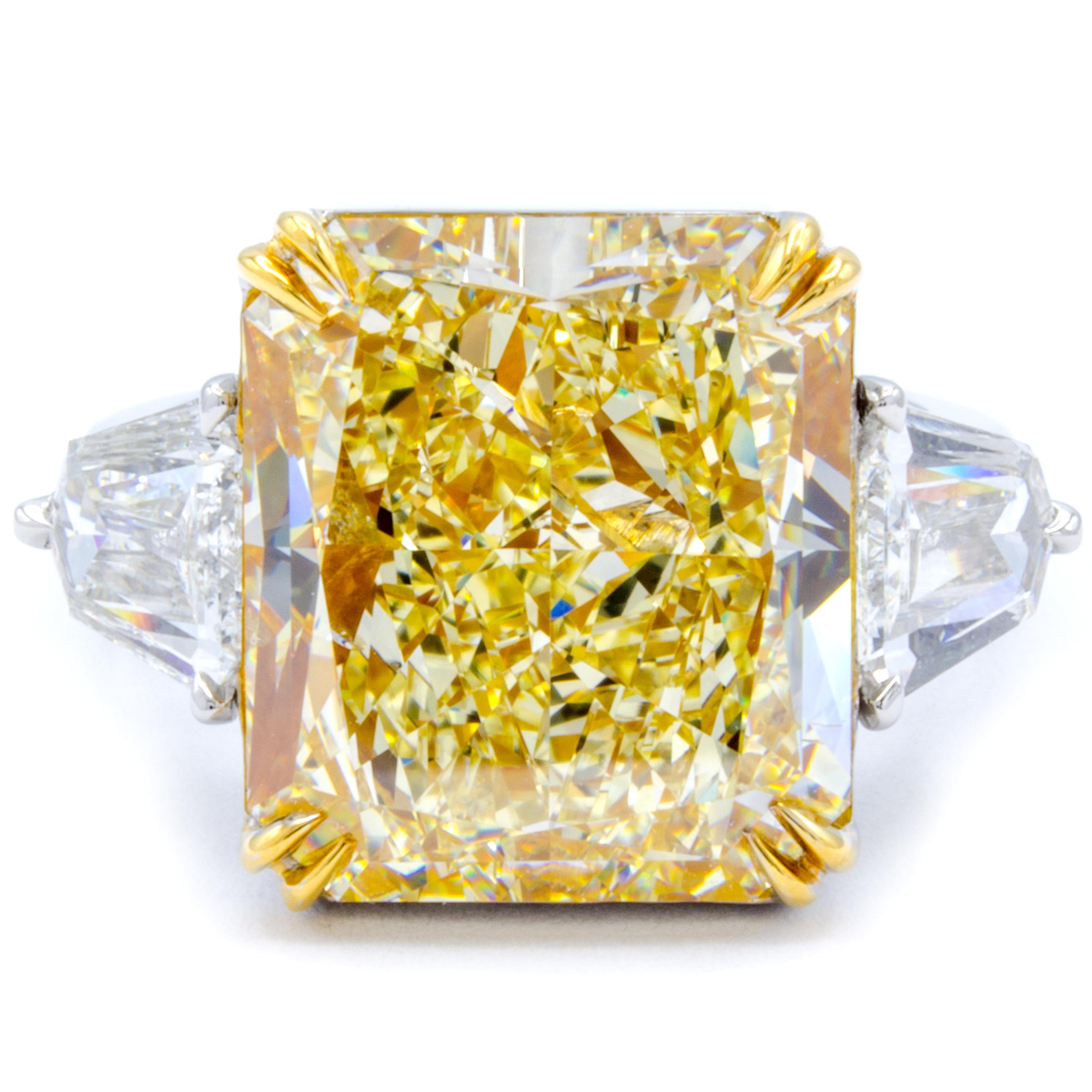 Rosenberg Diamonds & Co. 13.03 carat Radiant cut Light Yellow VS2 clarity is accompanied by a GIA certificate. This incredible bright Radiant is full of life and it is set in a handmade platinum and 18 karat yellow gold setting with perfectly