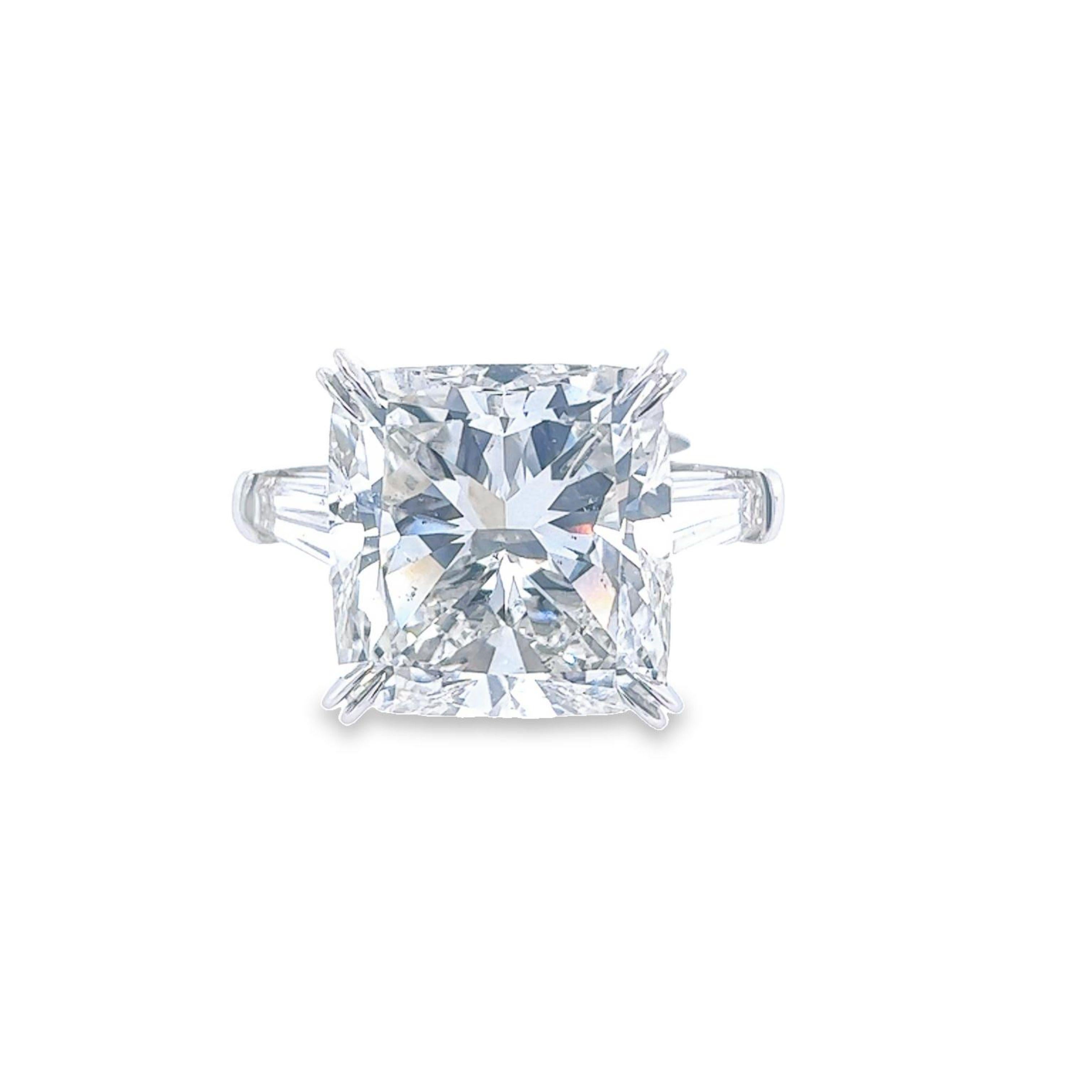 Rosenberg Diamonds & Co. 15.71 carat Cushion cut I color SI2 clarity is accompanied by a GIA certificate. This spectacular 
cushion is full of brilliance and an exceptional SI2 that is set in a handmade platinum setting with perfectly matched pair