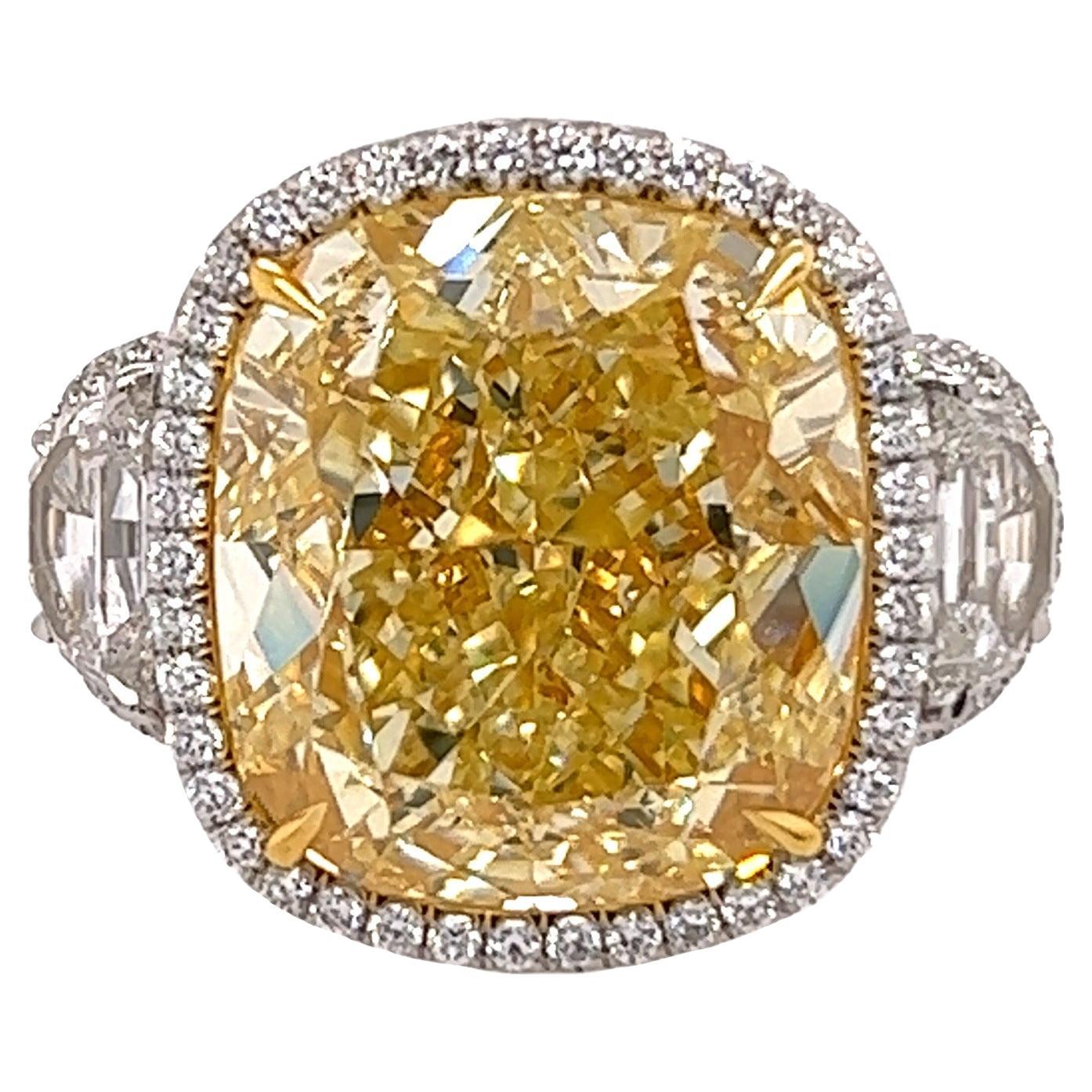 Rosenberg Diamonds & Co. 16.06 carat Cushion Cut Fancy Yellow VS2 clarity is accompanied by a GIA certificate. This spectacular Cushion is full of brilliance and it is set in a handmade platinum & 18 karat yellow gold setting with perfectly matched