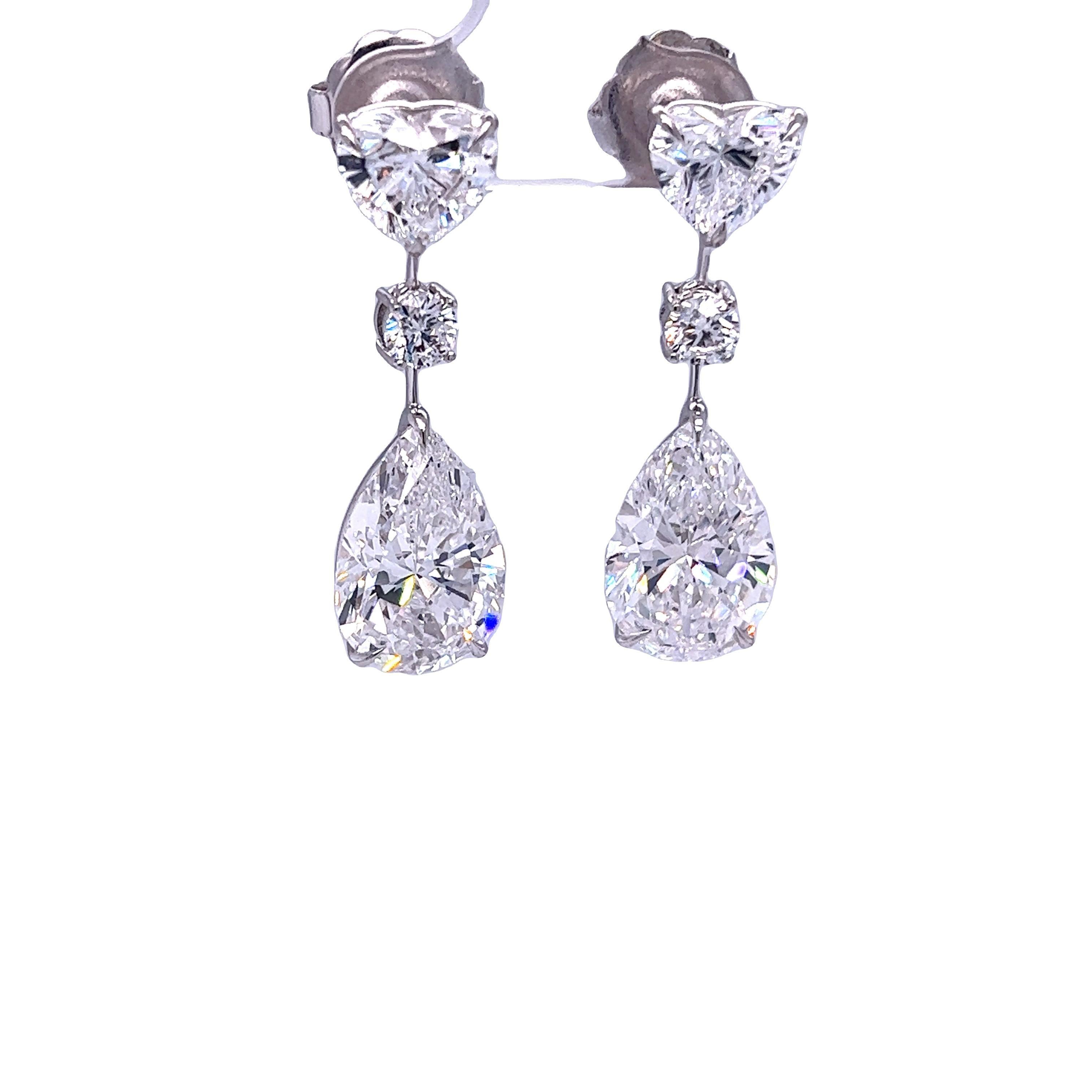 Rosenberg Diamonds & Co. 16.72 total carat weight D Internally Flawless GIA Certified is the ultimate perfection for a diamond pair of earrings. This one-of-a-kind masterpiece consist of a matched pair of 12.08 total carat weight Pear Shapes, 4.02