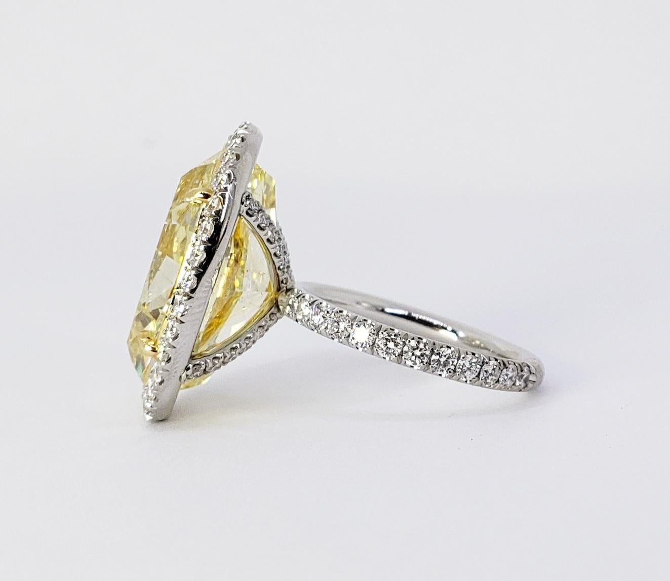 oval yellow diamond engagement ring