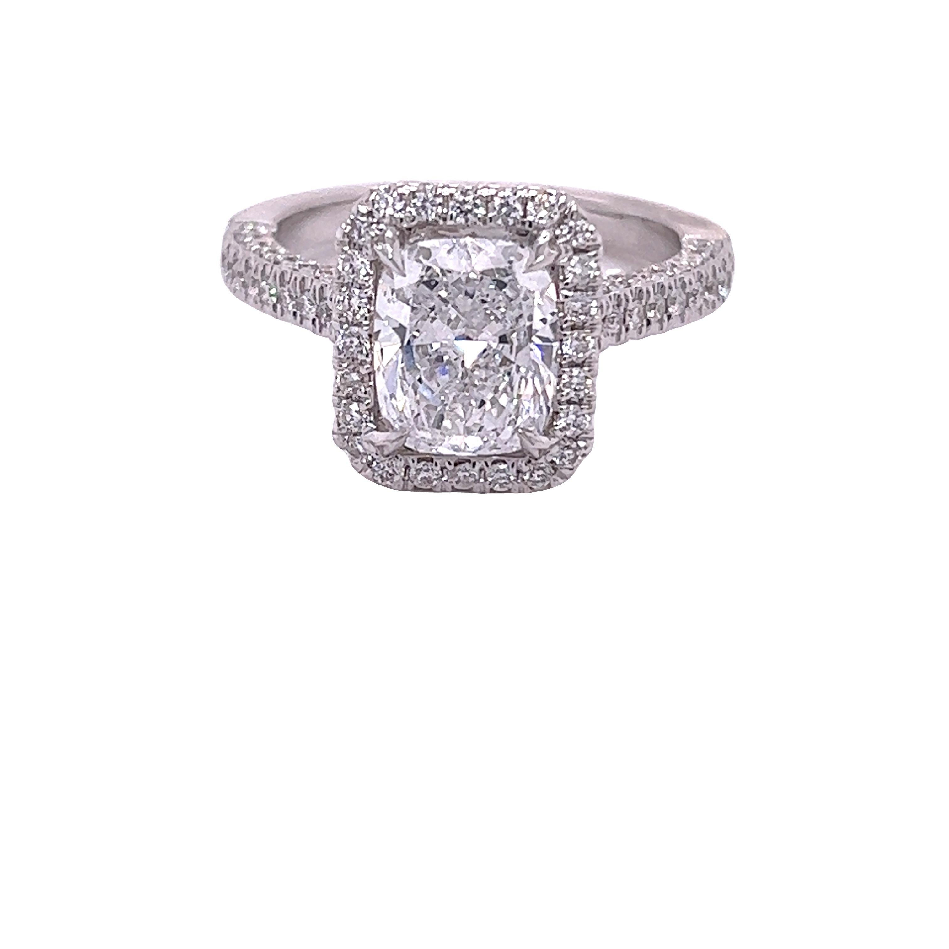 Rosenberg Diamonds & Co. 2.04 carat Cushion Cut D color SI2 clarity is accompanied by a GIA certificate. This exceptional SI2 elongated Cushion is full of brilliance and is set in a handmade 18 karat white gold setting. This ring completes its