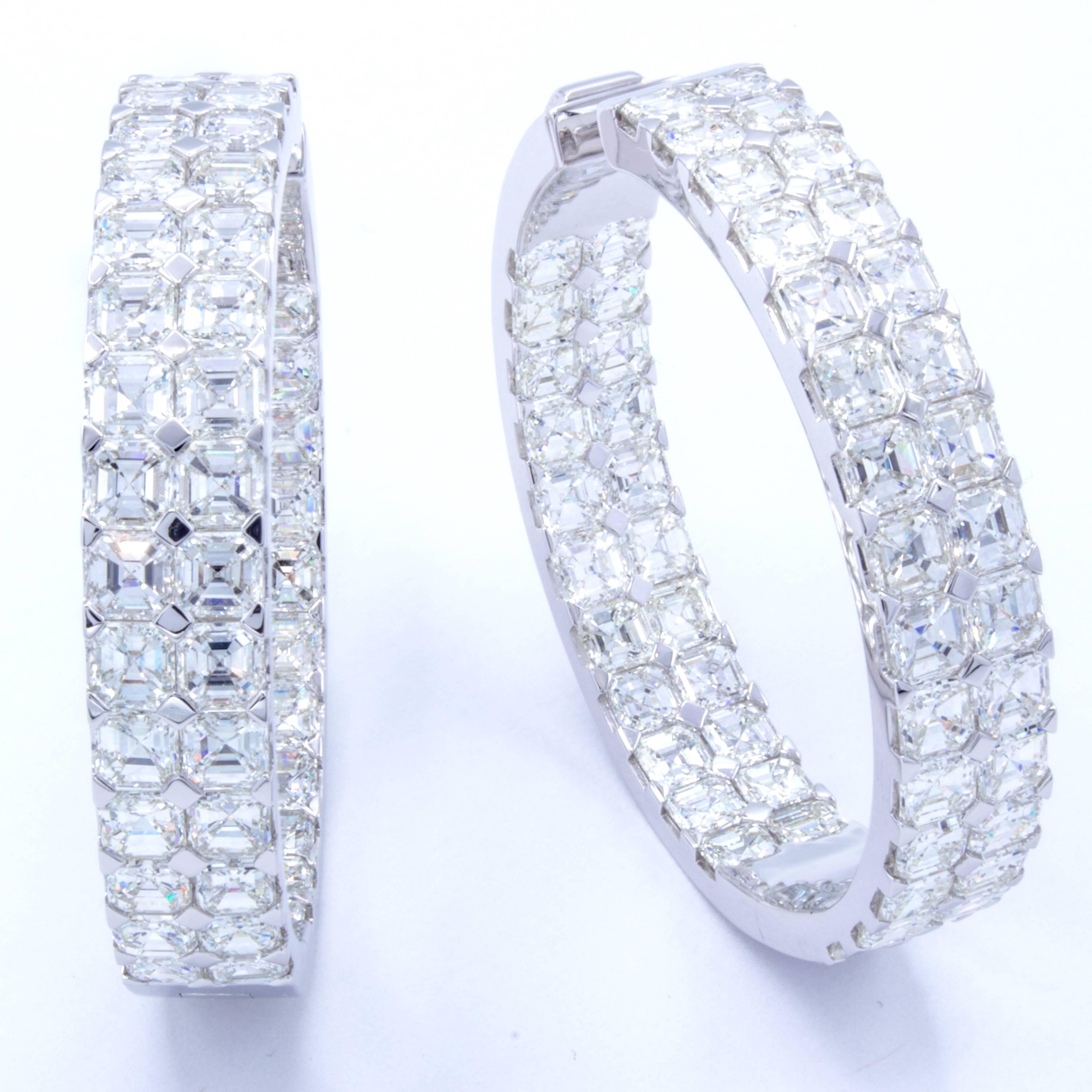 A pair of exceptionally brilliant hoop earrings by Rosenberg Diamonds & Co. The earrings feature over 20 carats worth of collection quality Asscher cut diamonds set into 18Kt white gold. The diamonds span both the outside and the inside of the