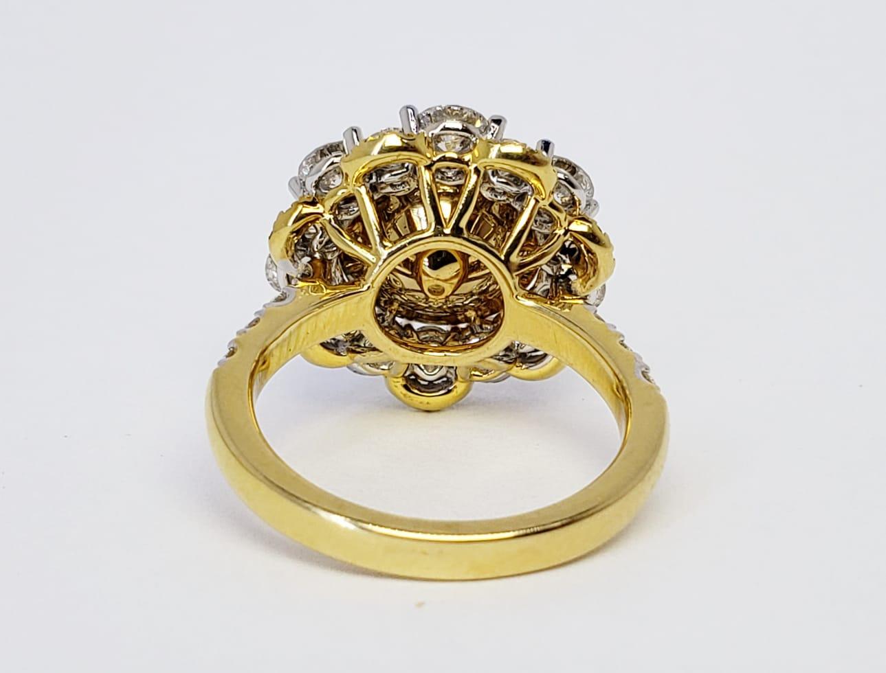 Rosenberg Diamonds & Co. 2.56 carat Round brilliant Fancy Light Yellow VVS1 clarity is accompanied by a GIA certificate. This extremely rare Round diamond named THE ECLIPSE is set in a handmade 18 karat white & yellow gold setting. This ring boasts