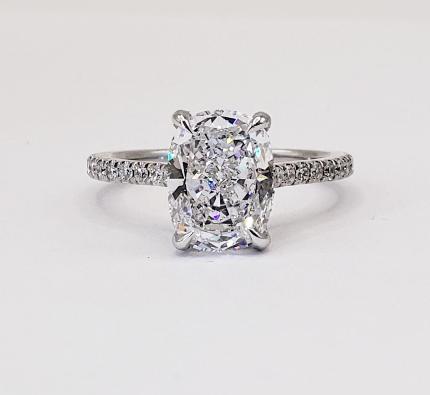 Rosenberg Diamonds & Co. 3.04 carat Cushion cut D color SI1 clarity is accompanied by a GIA certificate. This spectacular elongated Cushion is full of brilliance and it is set in a handmade platinum setting. This ring continues its elegance with a